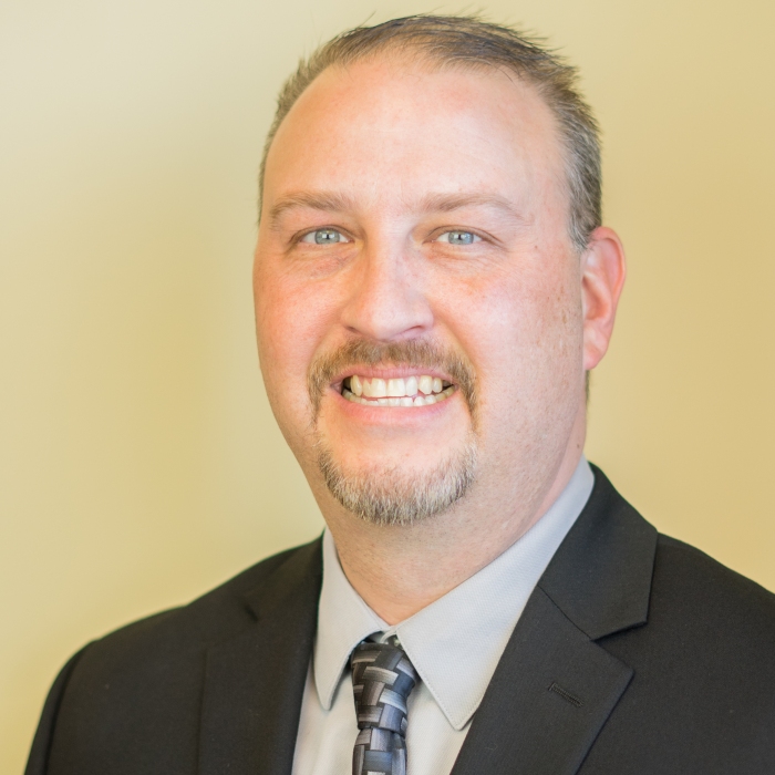 Professional portrait of a man in a suit
