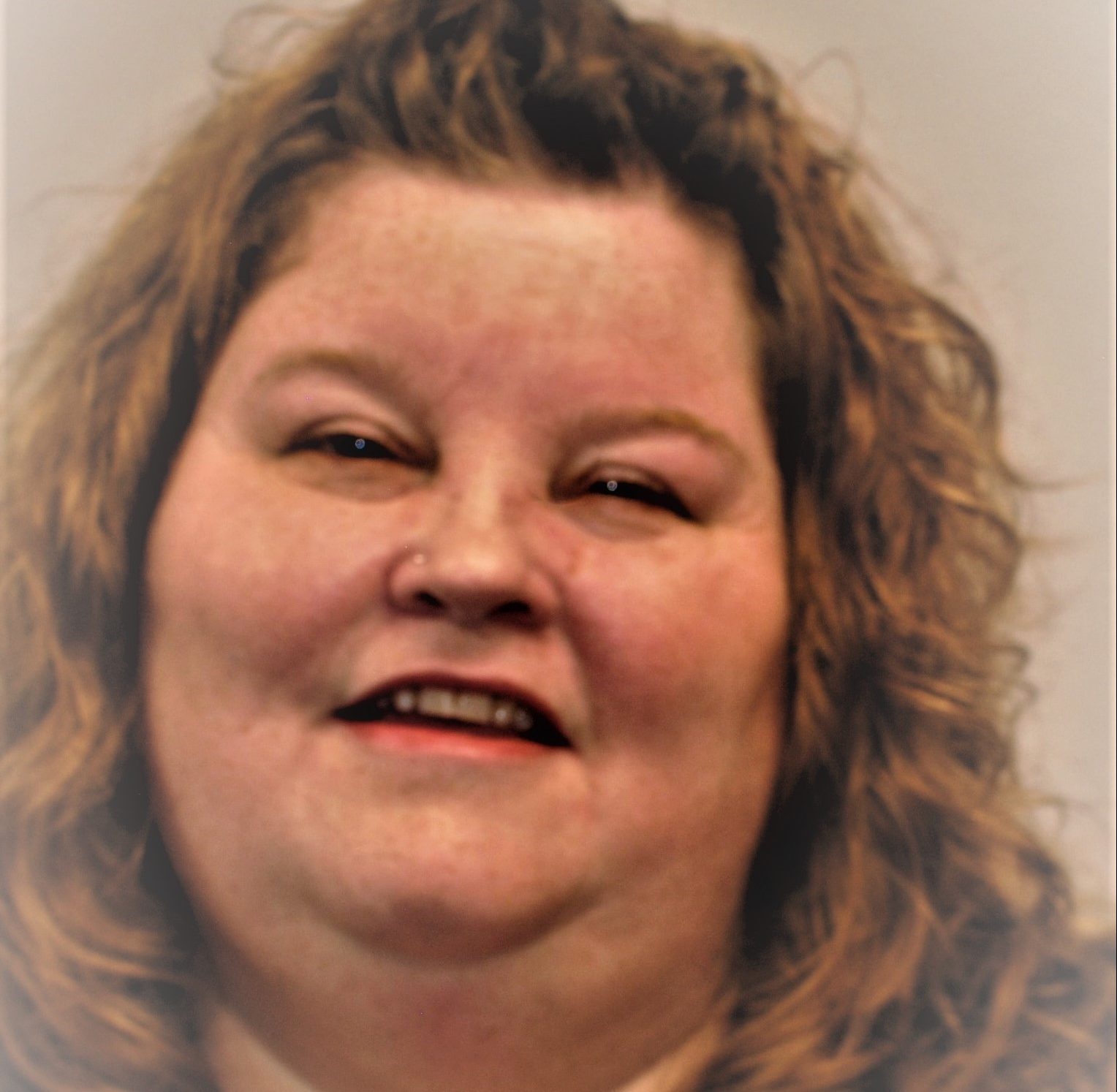Portrait of a staff member smiling