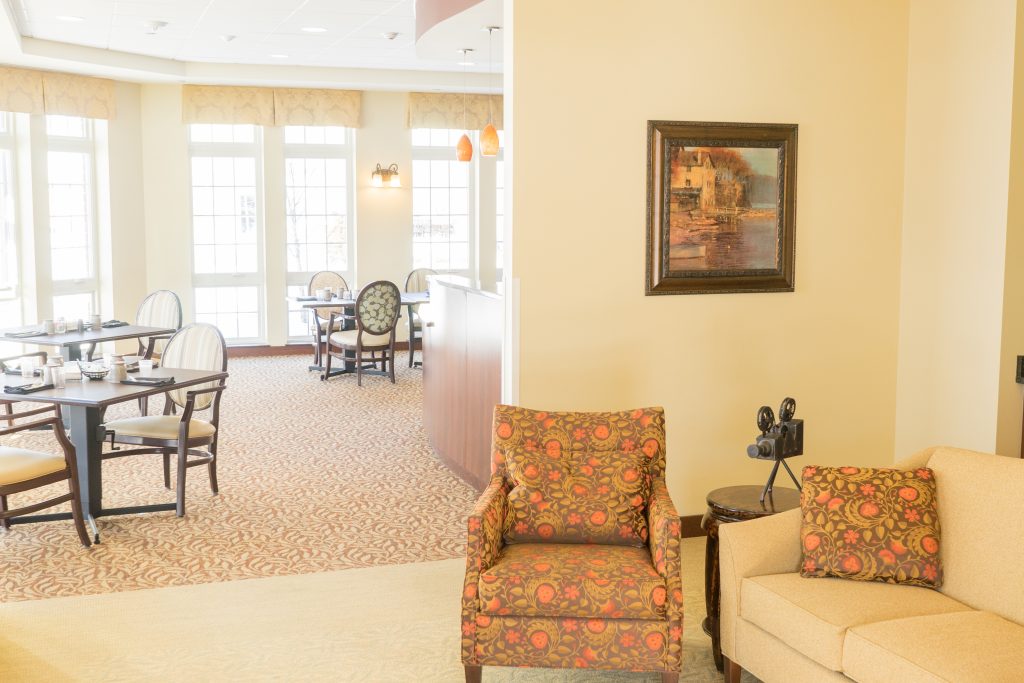 Common area with dining setup and seating