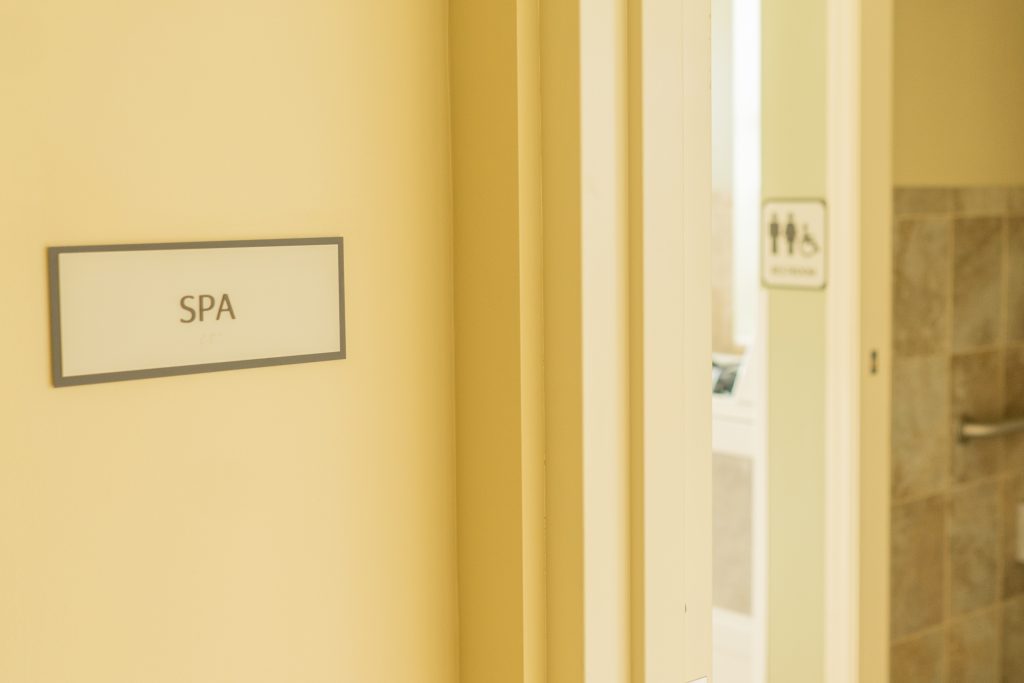 Sign indicating the spa area within the facility