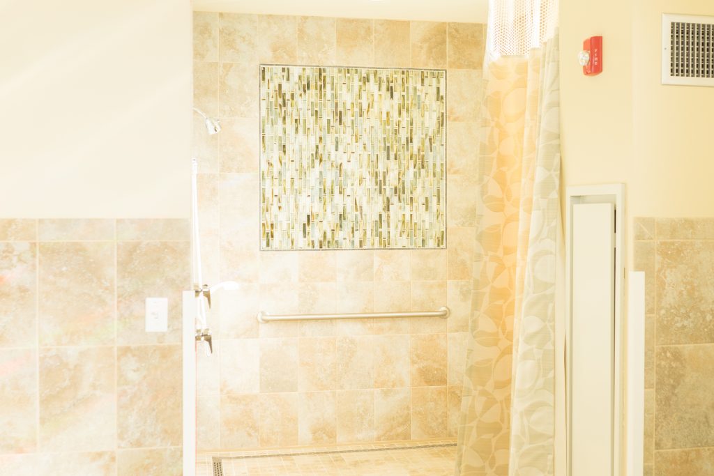 Interior shot of a shower area in a facility