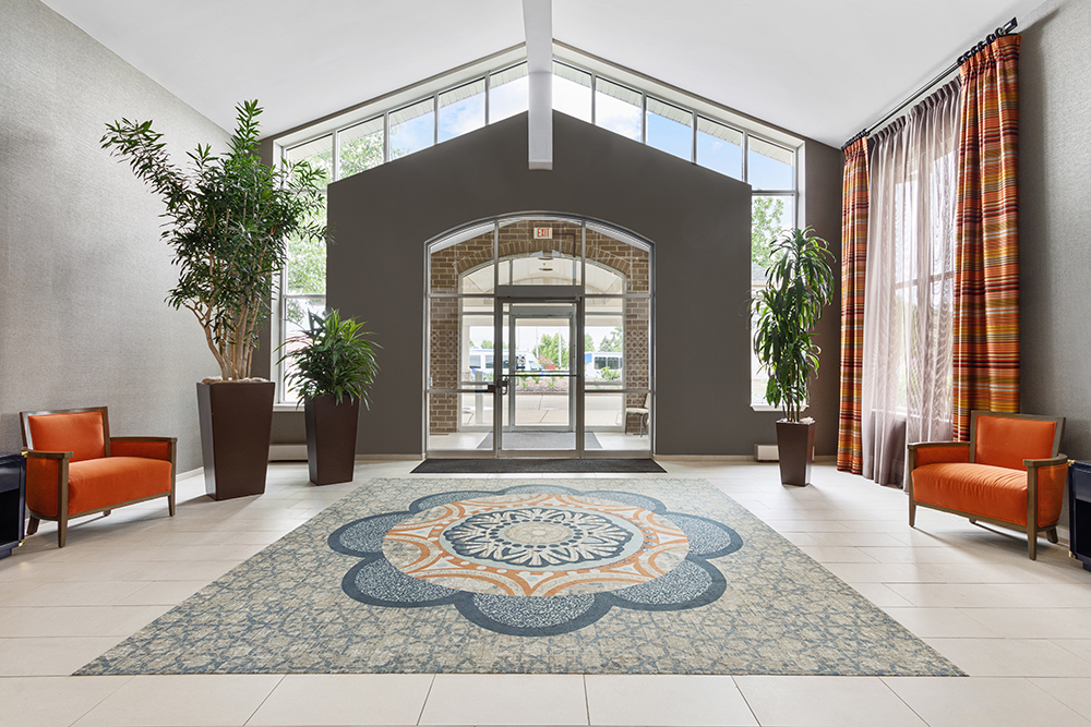 Bright lobby area with seating and large windows