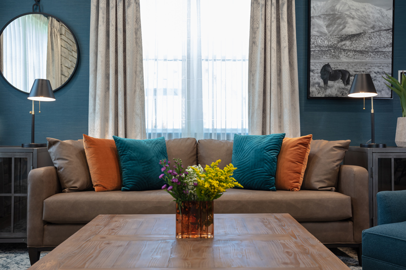 Comfortable lounge area with a sofa and decorative pillows