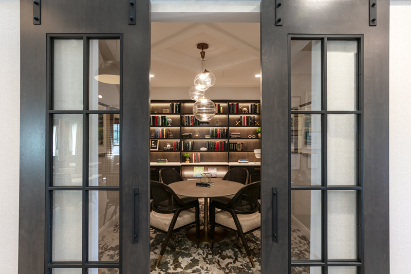 Interior view of a cozy reading room with bookshelves