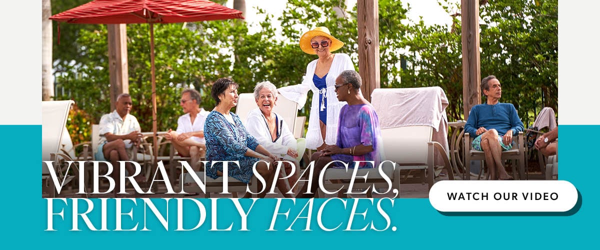 Residents enjoying social time outdoors in a sunny setting