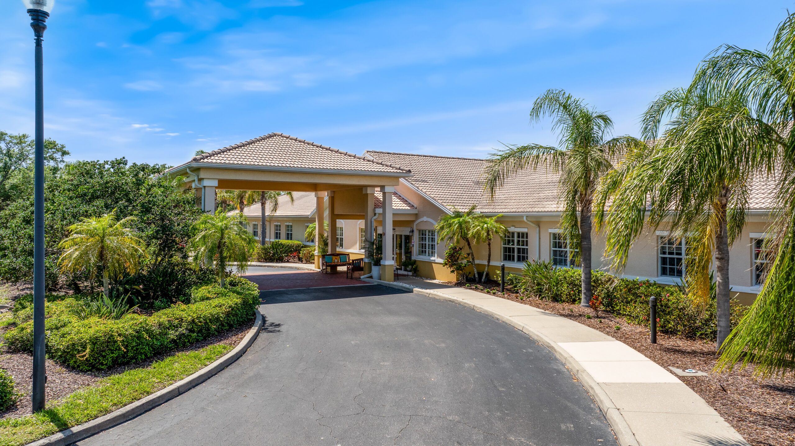 Exterior view of Aston Gardens at Pelican Pointe entrance