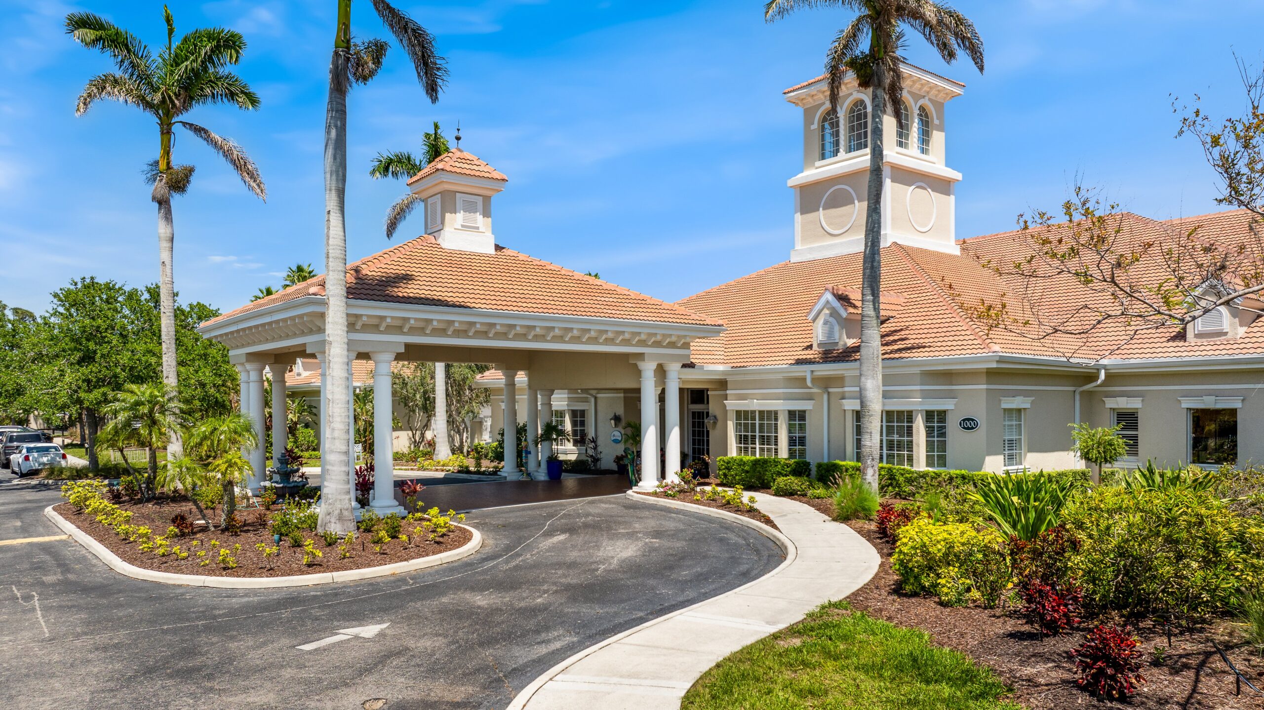 Exterior view of Aston Gardens at Pelican Pointe entrance