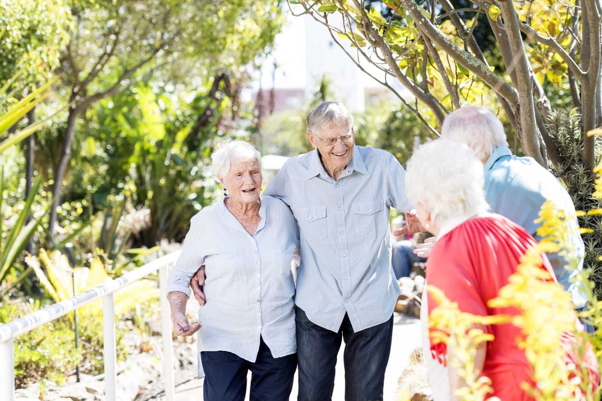 Residents enjoying time together in a garden