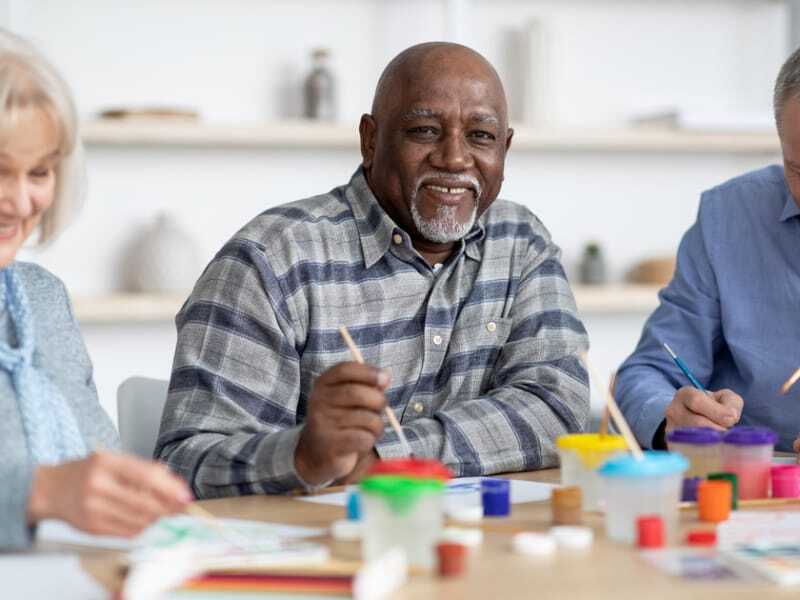 Residents participating in an art activity together