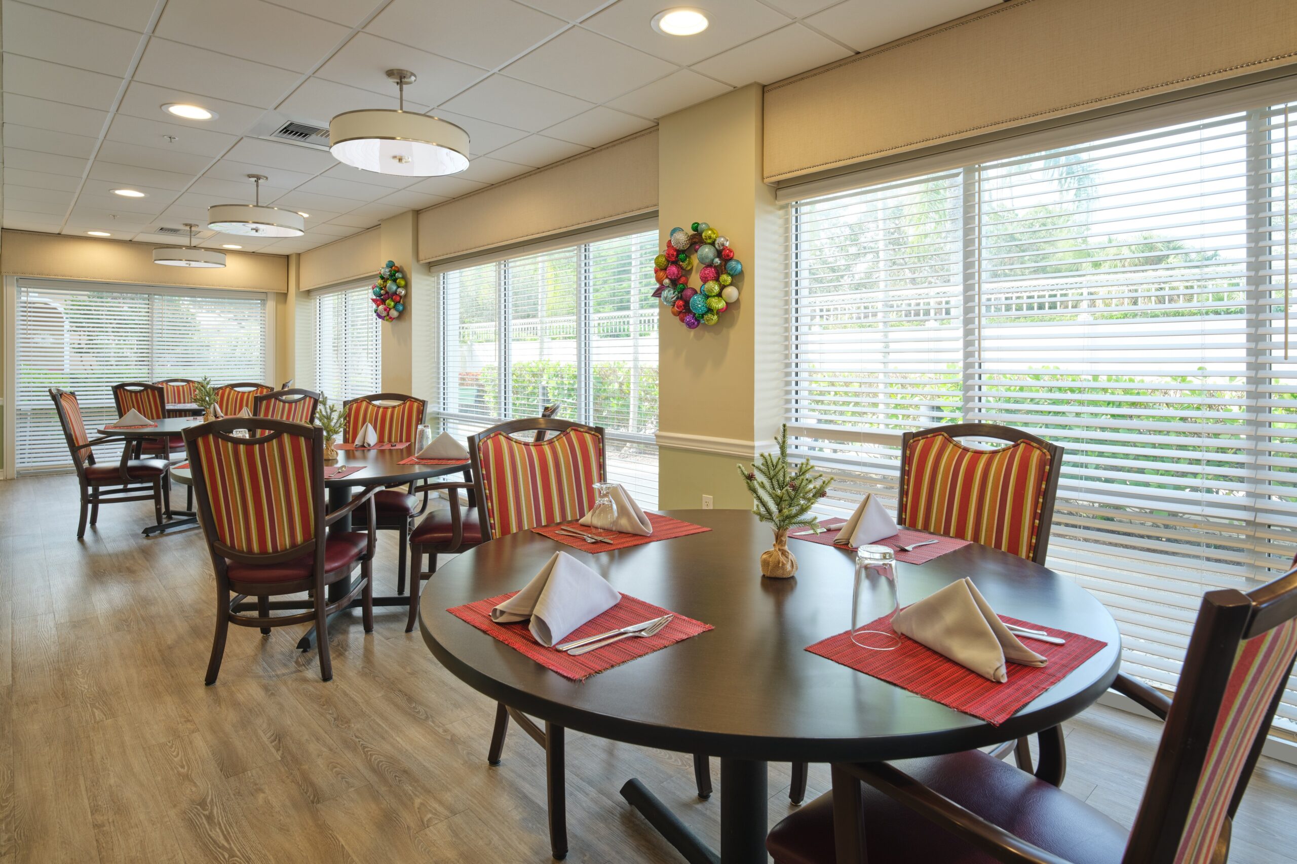Dining area with well-set tables and decorations