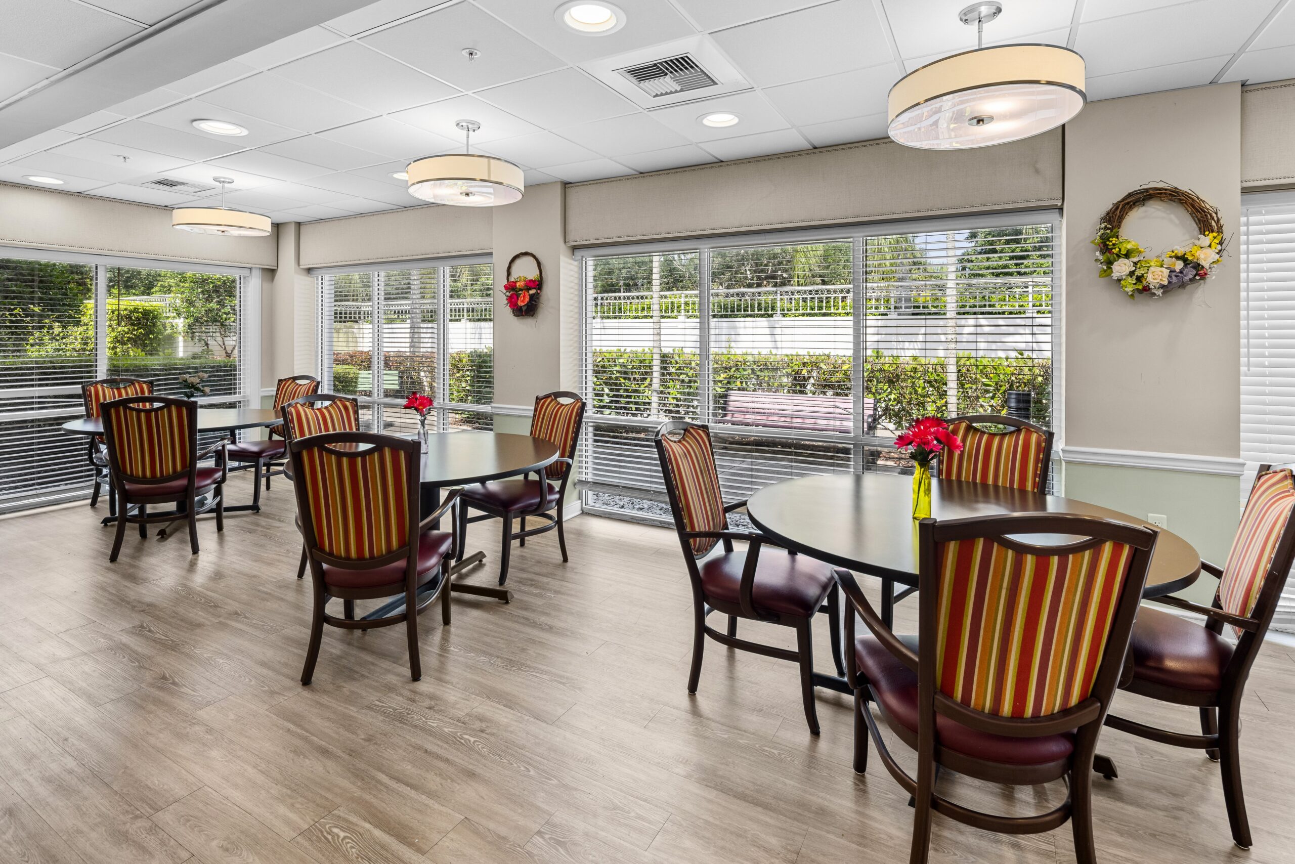 Bright dining area with tables and chairs