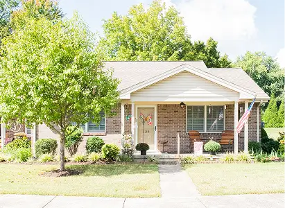 Exterior view of a residential building with landscaping