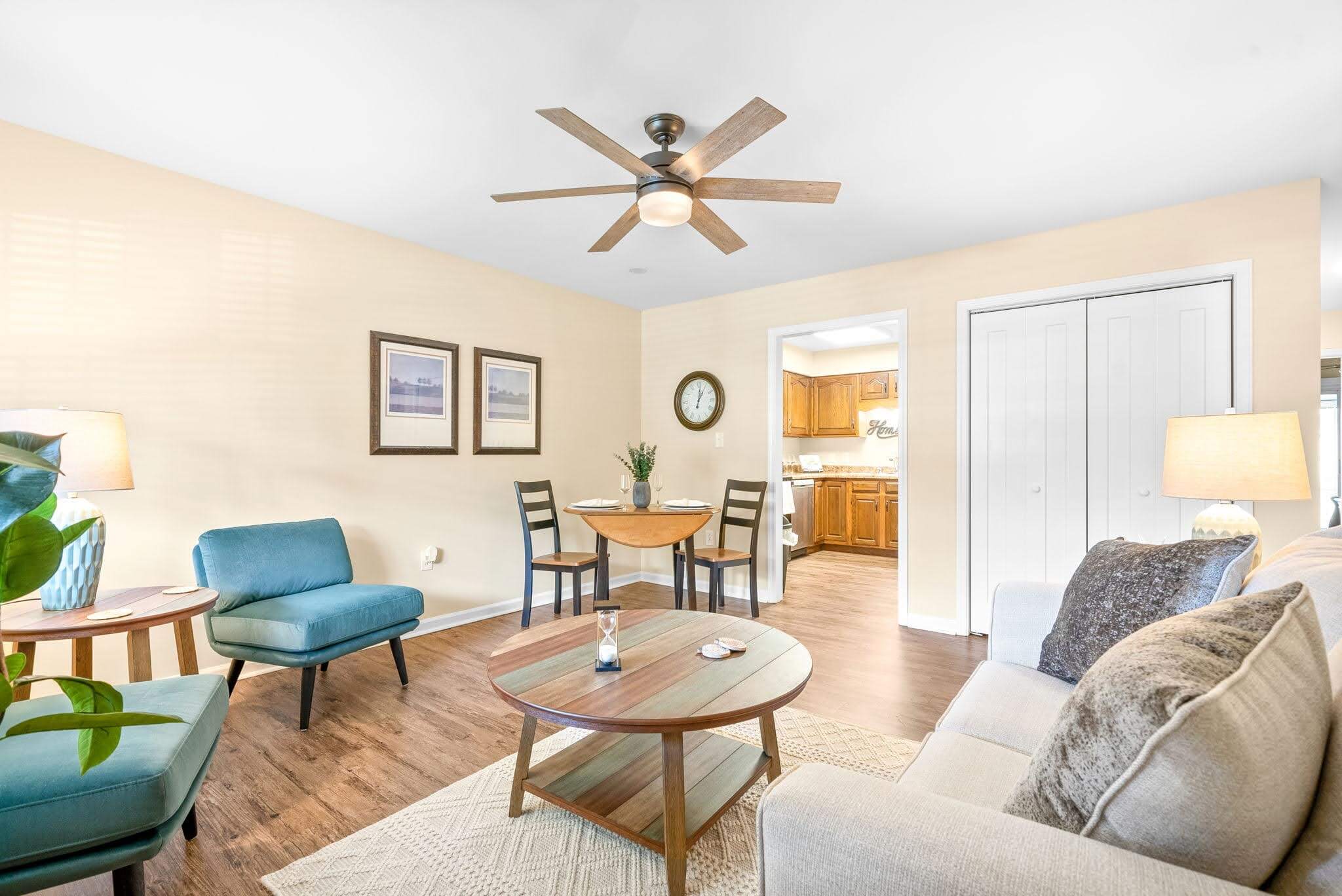 Bright interior living space with seating and dining area