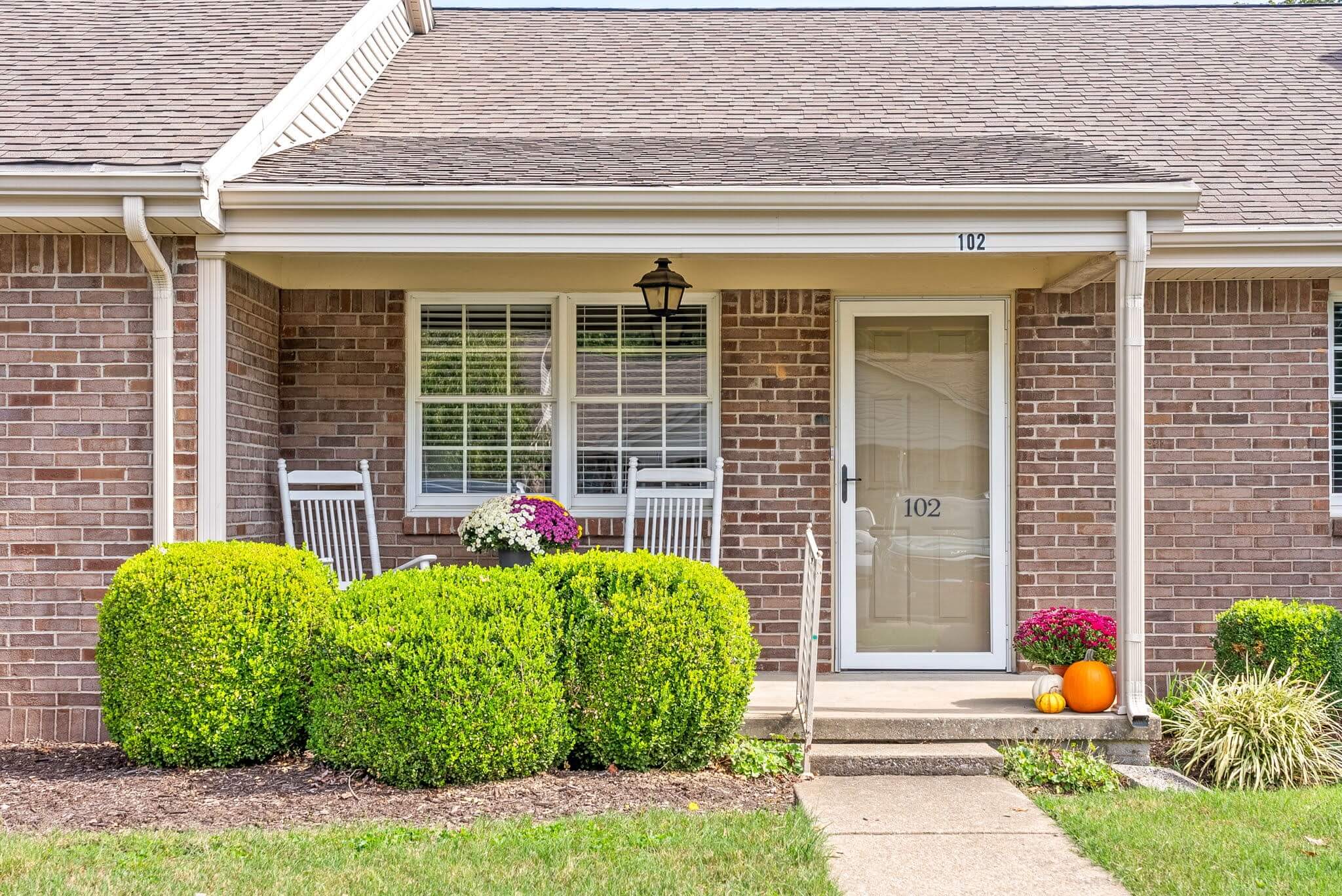 Exterior view of a charming resident porch with plants
