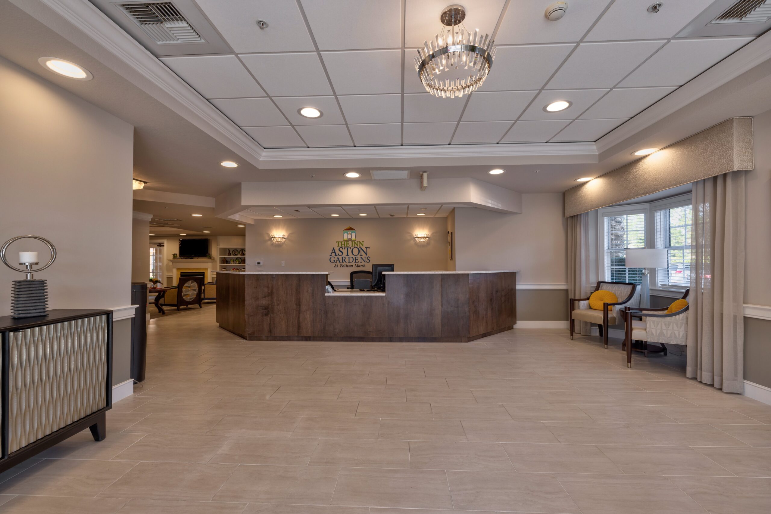 Bright, welcoming lobby area of Aston Gardens