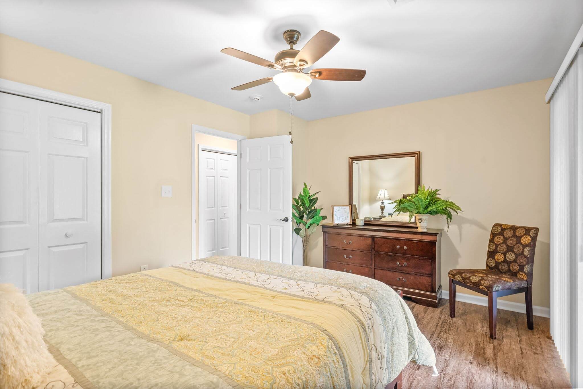 Cozy resident room with a bed and furniture