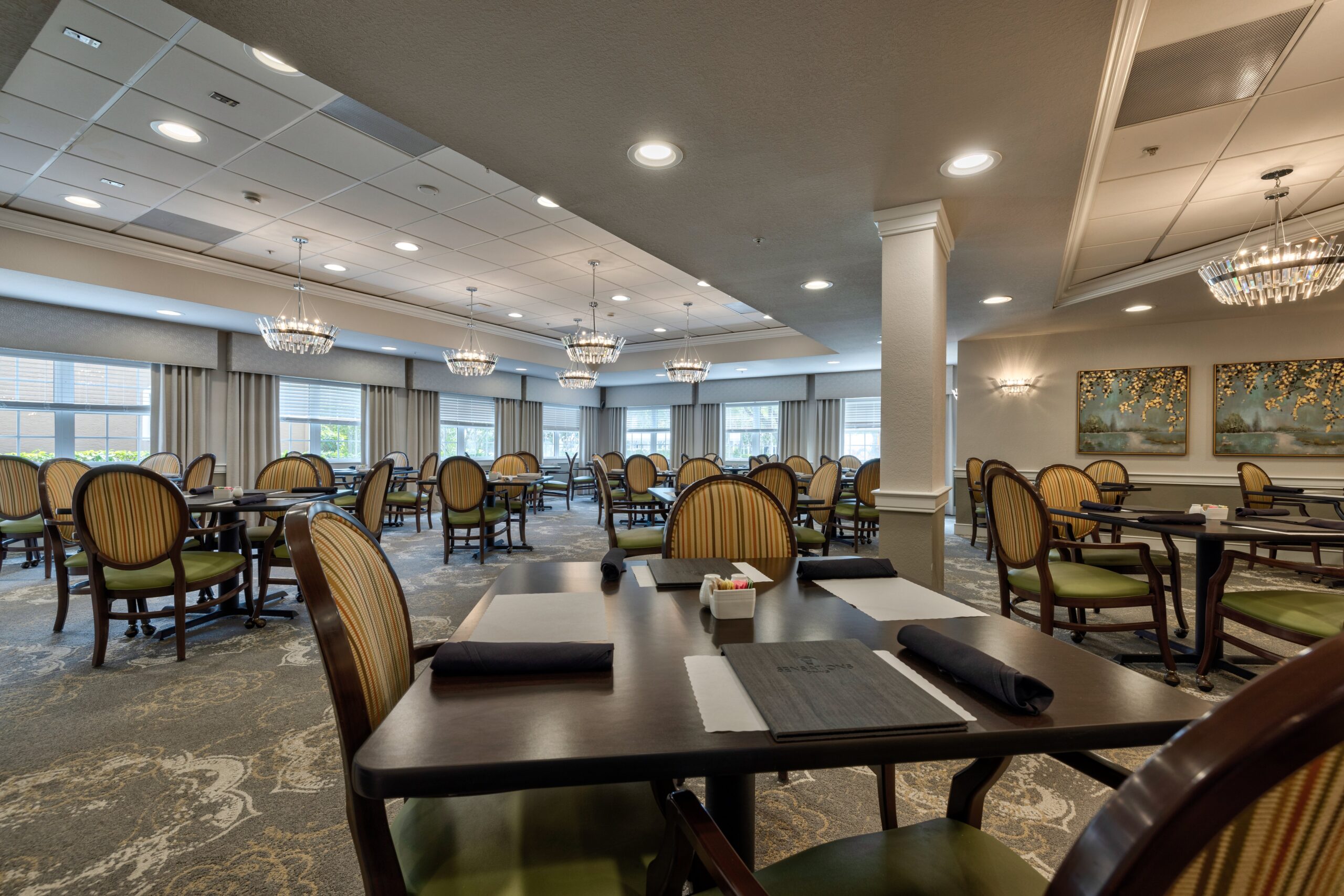 Elegant dining room with decorative lighting and tables