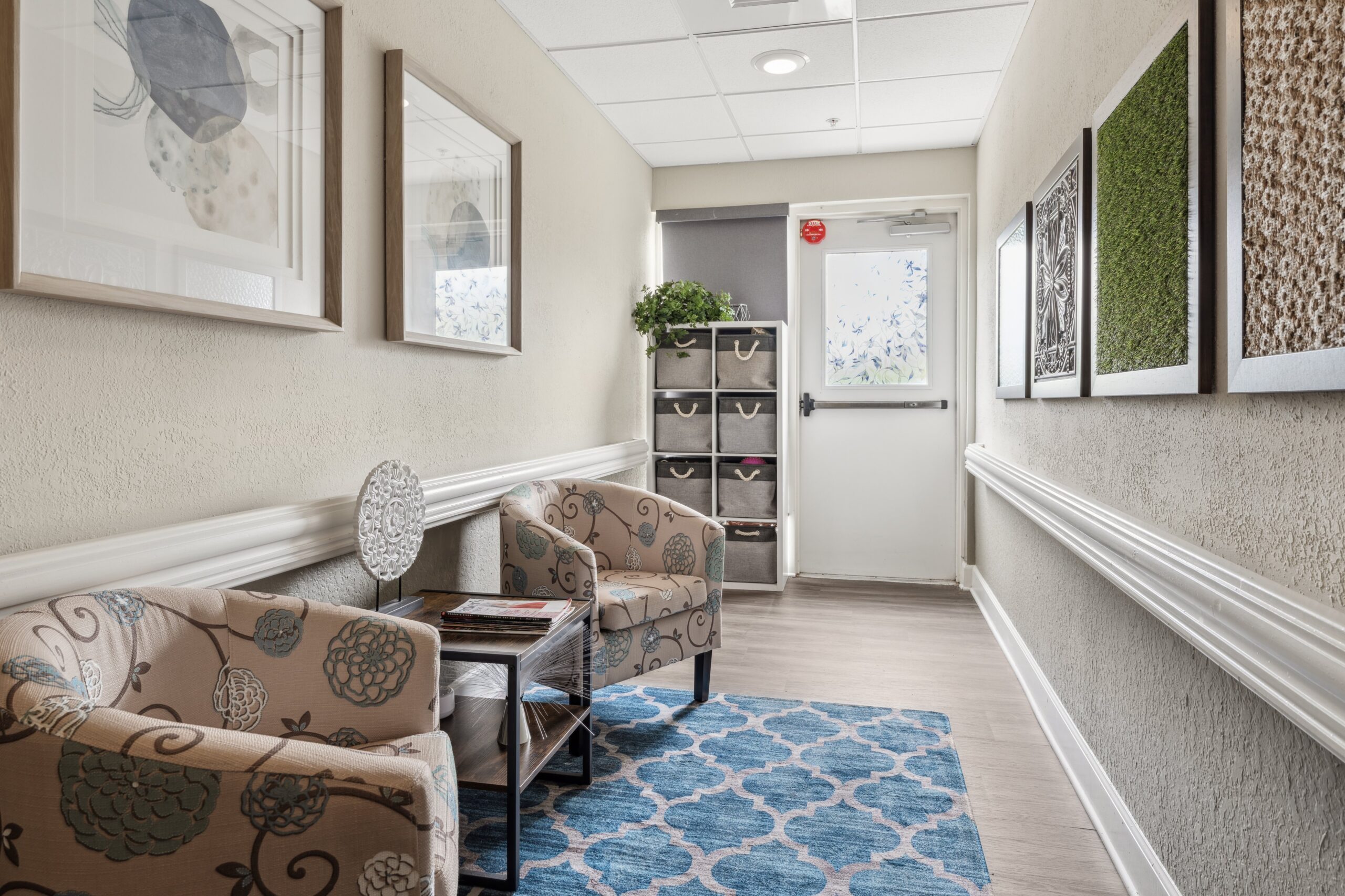 Bright and welcoming interior corridor with seating
