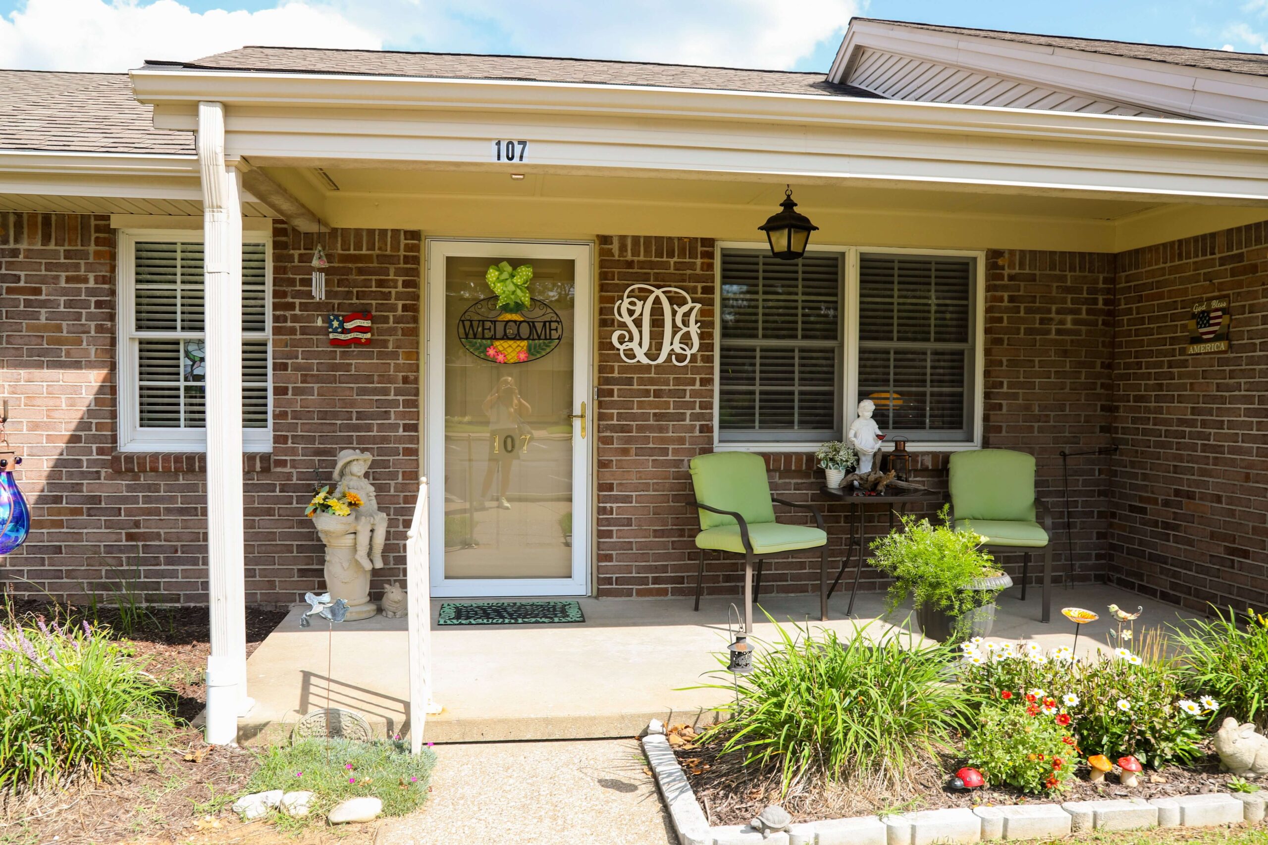 Welcoming porch area with seating and decorations
