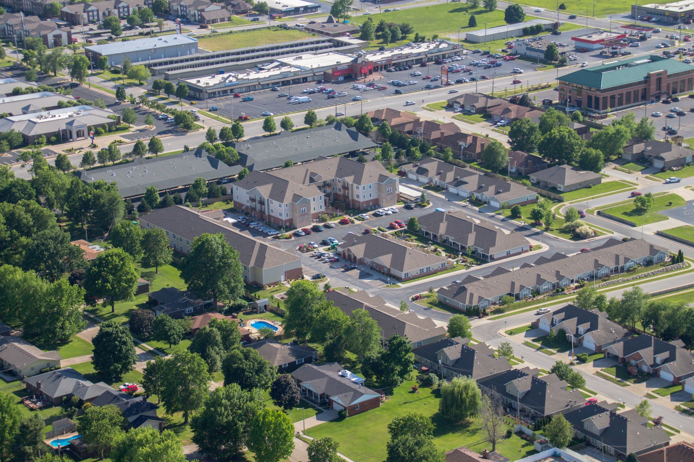 Aerial view of The Fremont Senior Living facility with outdoor spaces