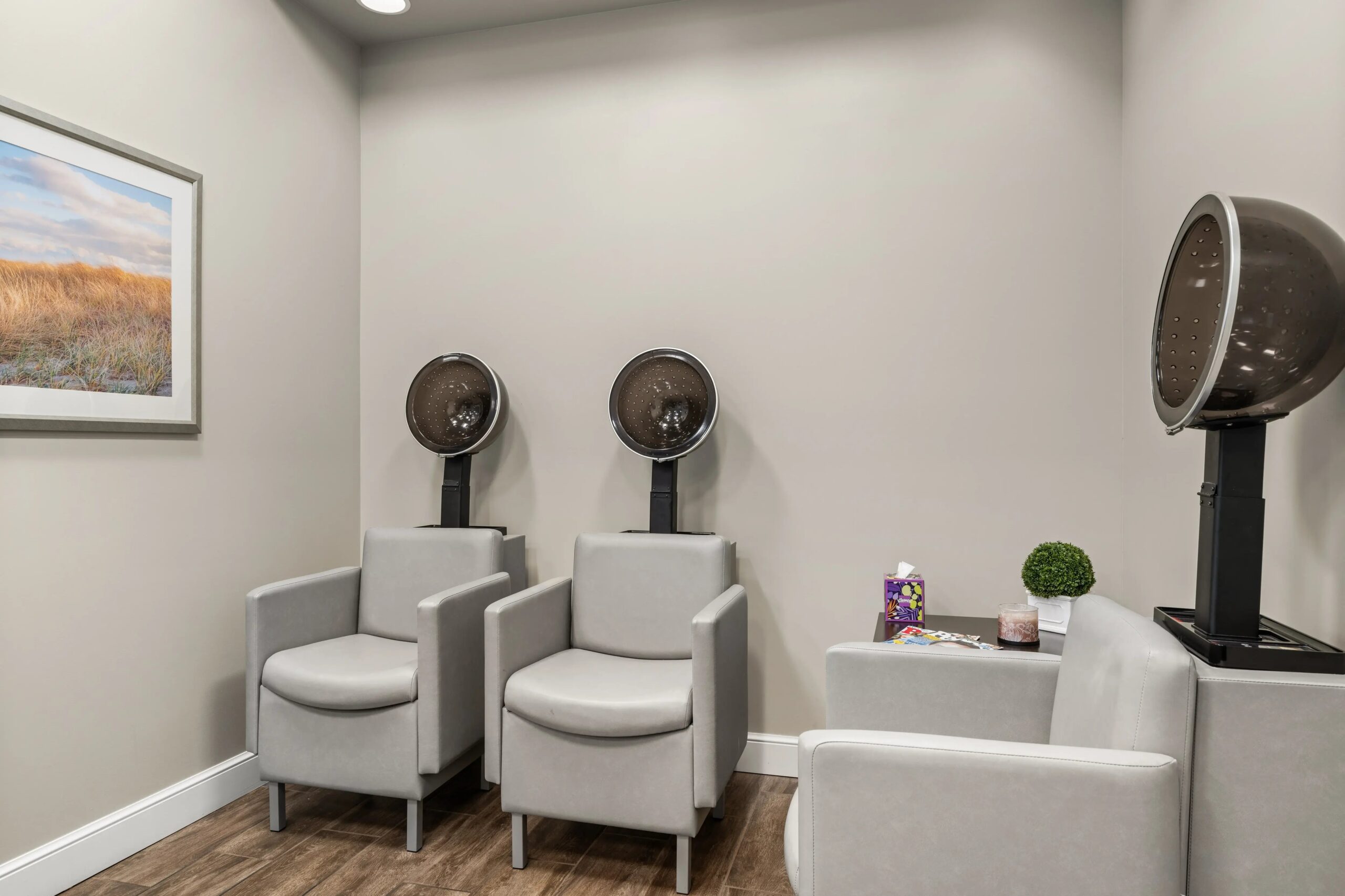 Interior salon area with hair dryers