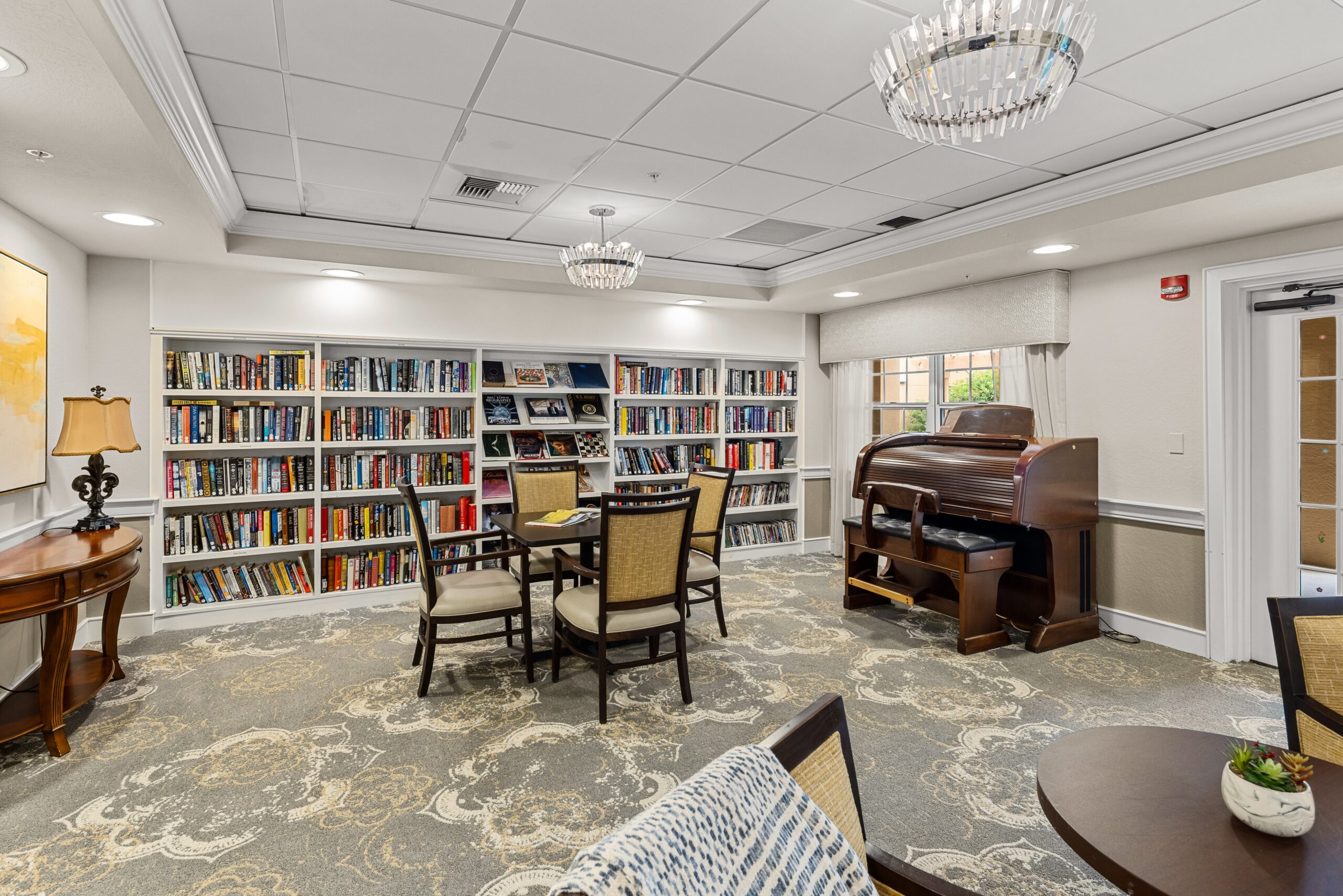 Interior of a cozy library with bookshelves and seating