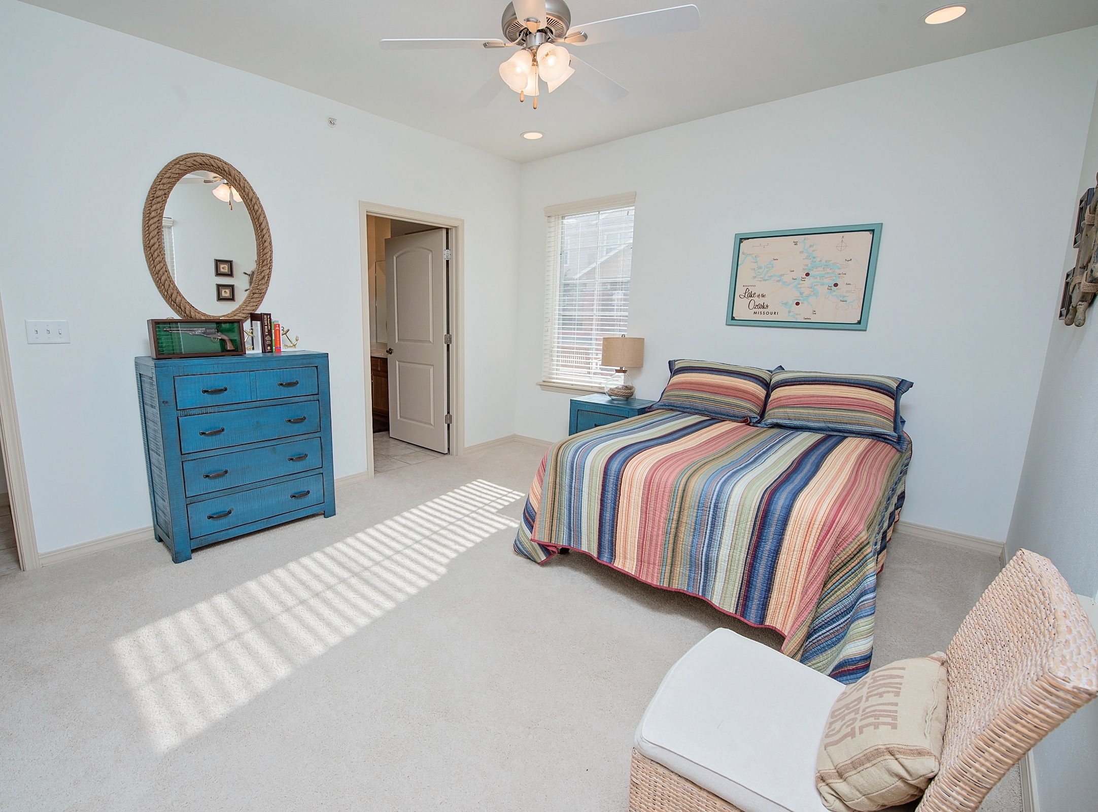 A private resident room with a bed and decor