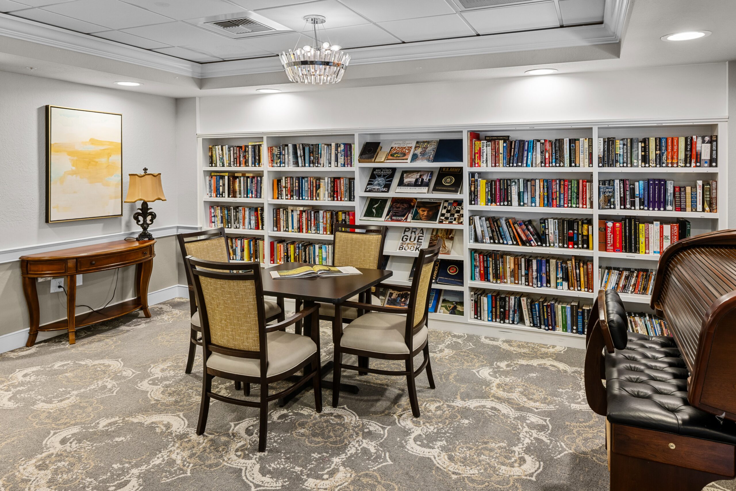 Cozy library area with bookshelves and seating