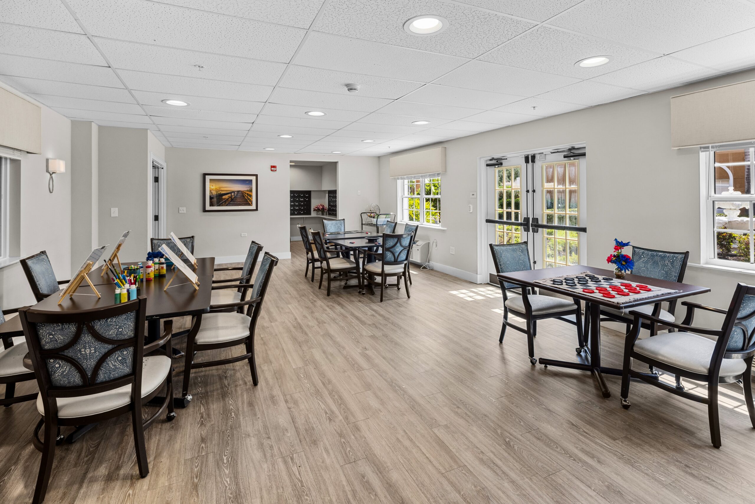 Bright activity room with tables and games