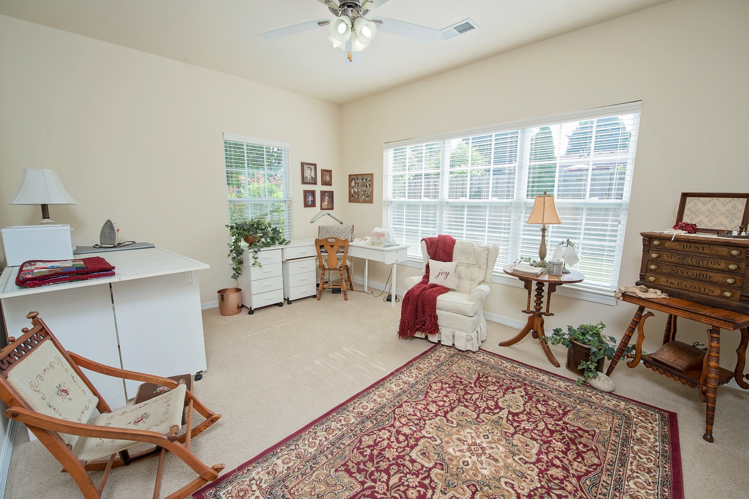 Cozy resident room with light-colored walls and seating area