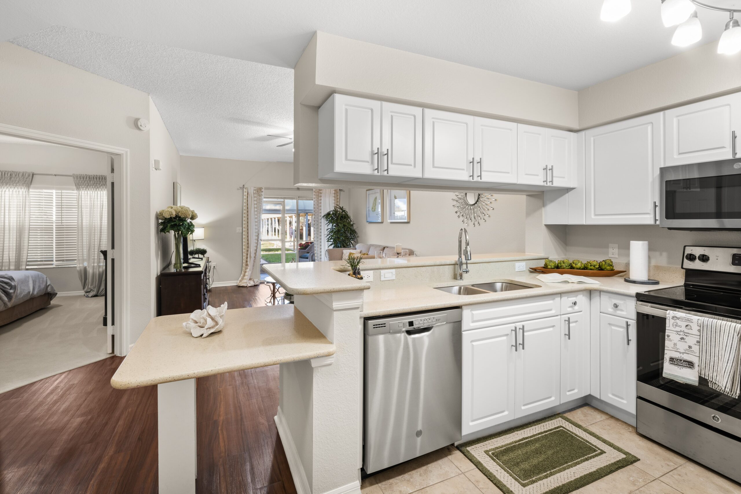 Bright kitchen interior with modern appliances and decor