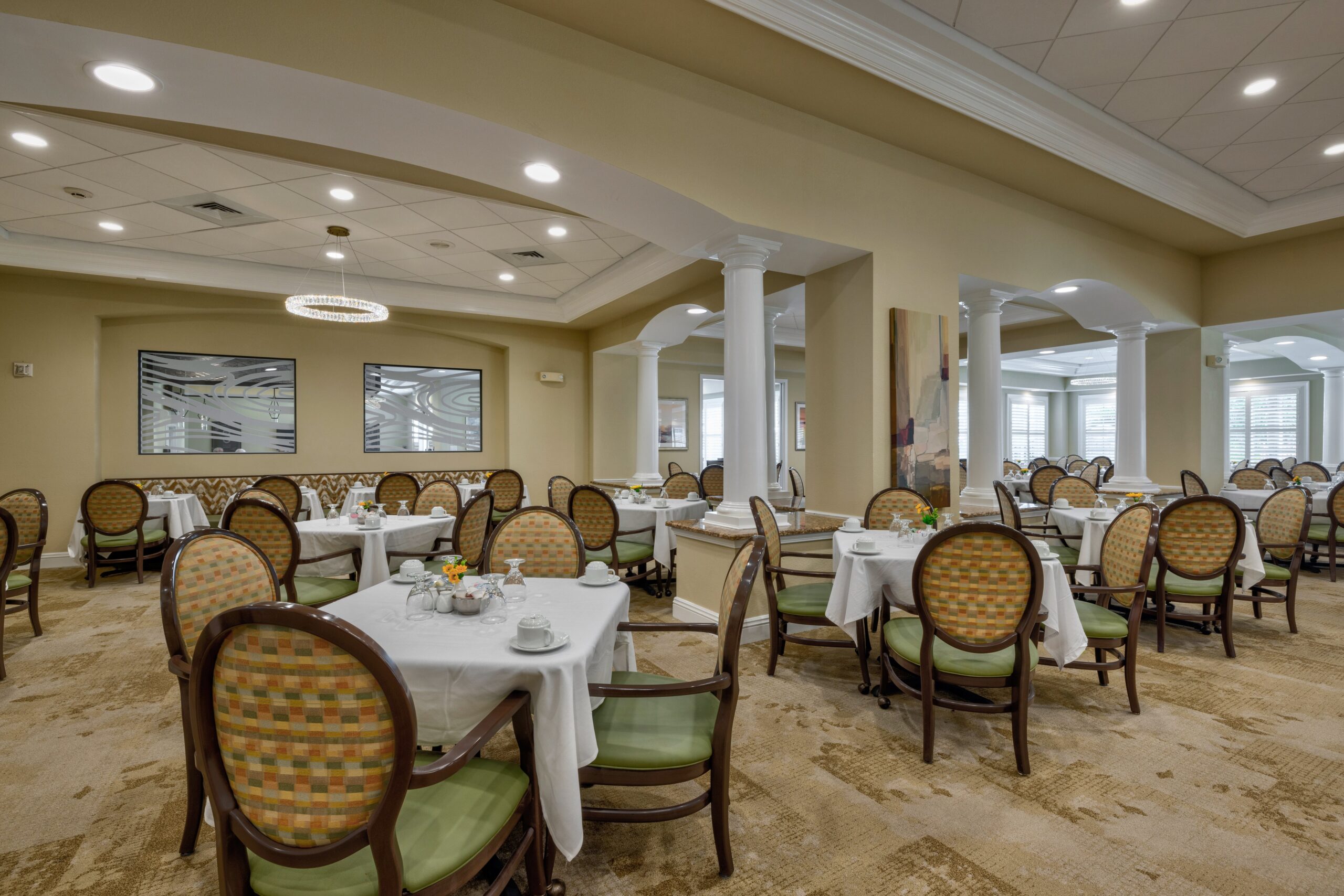 Dining room with tables set for meals