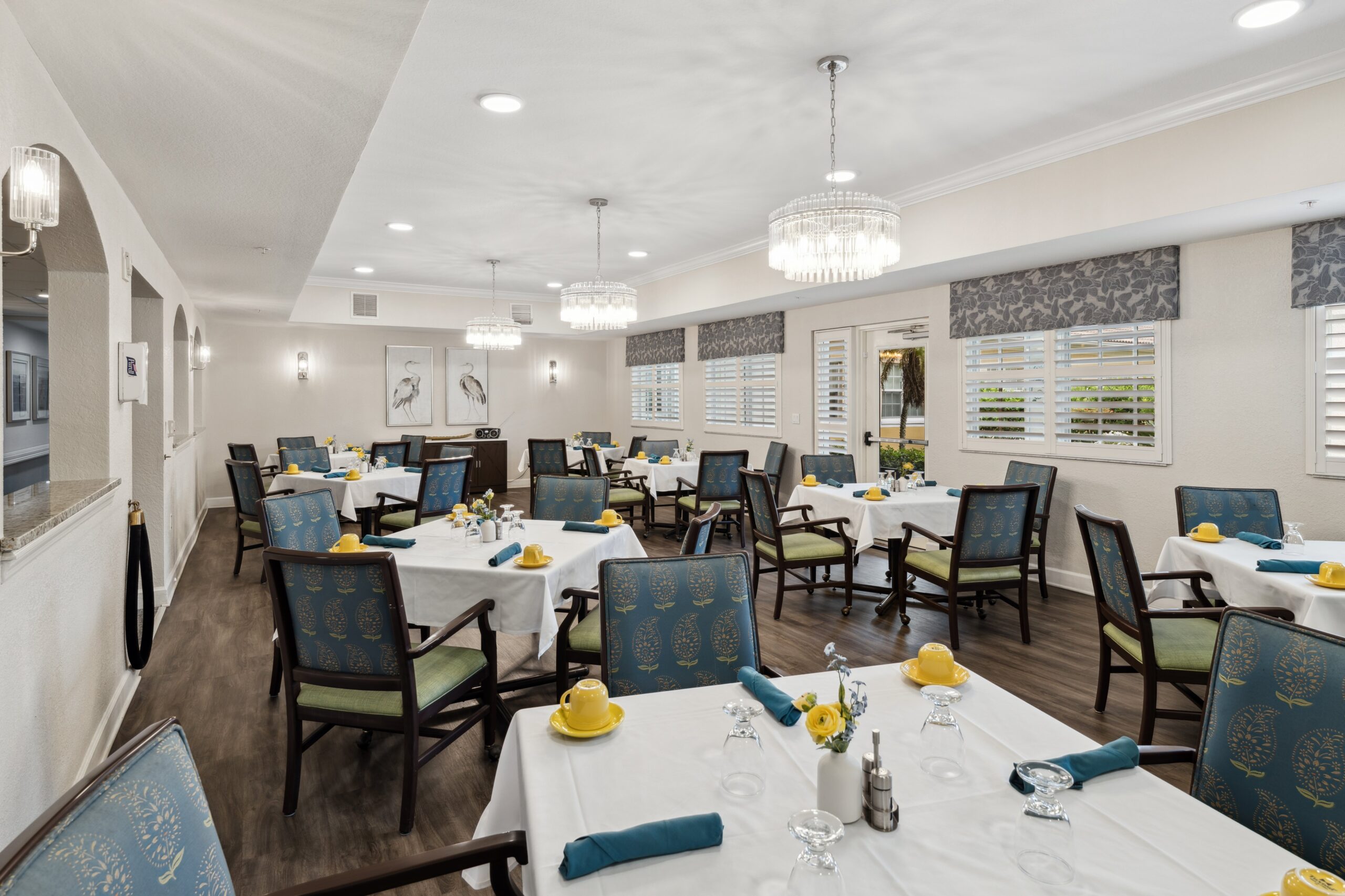 Dining room with set tables and decorations