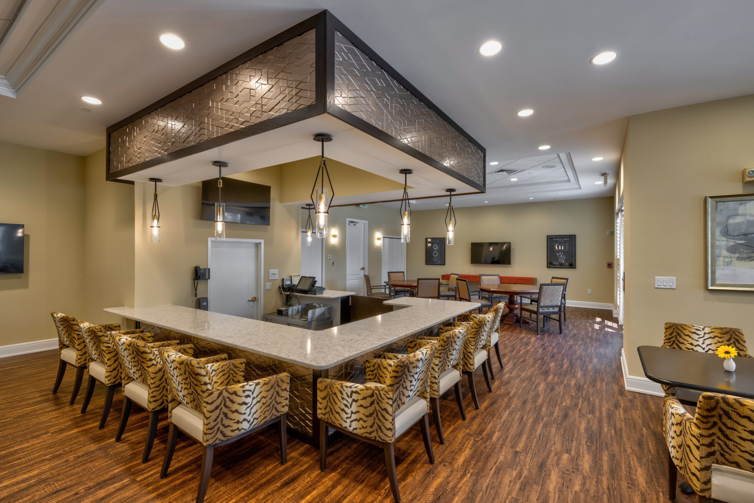 Bright common area with modern furnishings and lighting