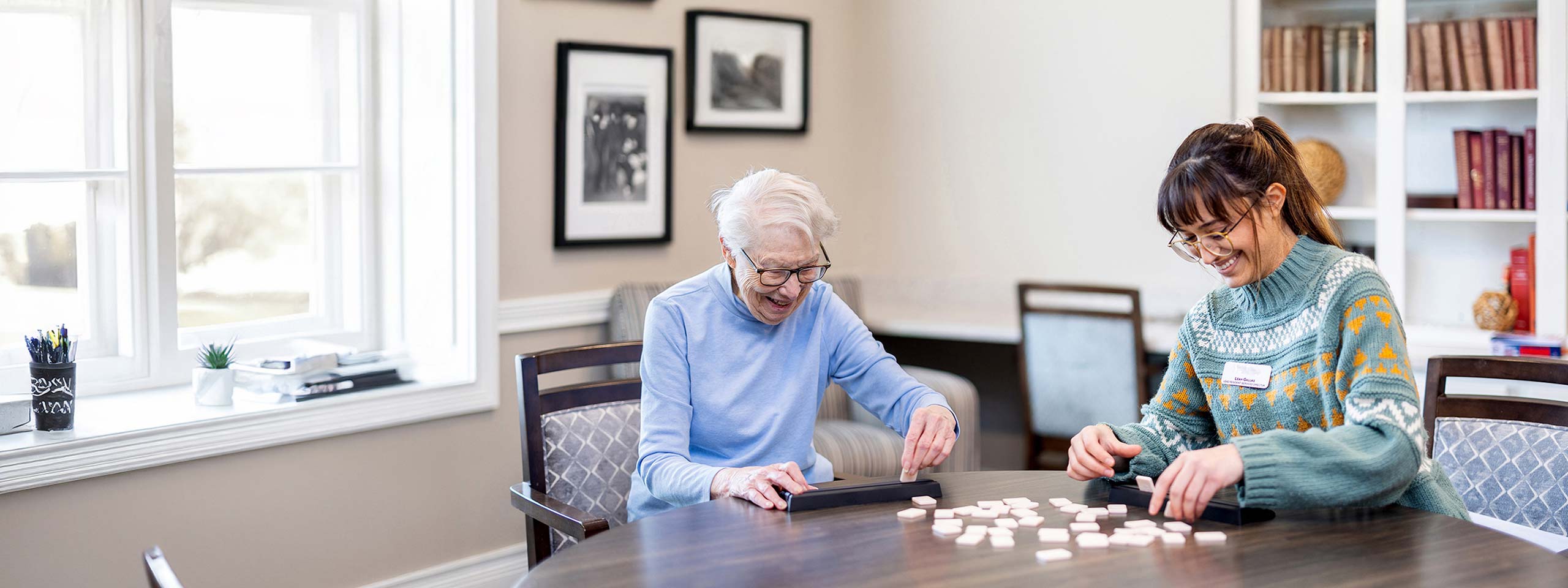 Residents playing a game in a common area