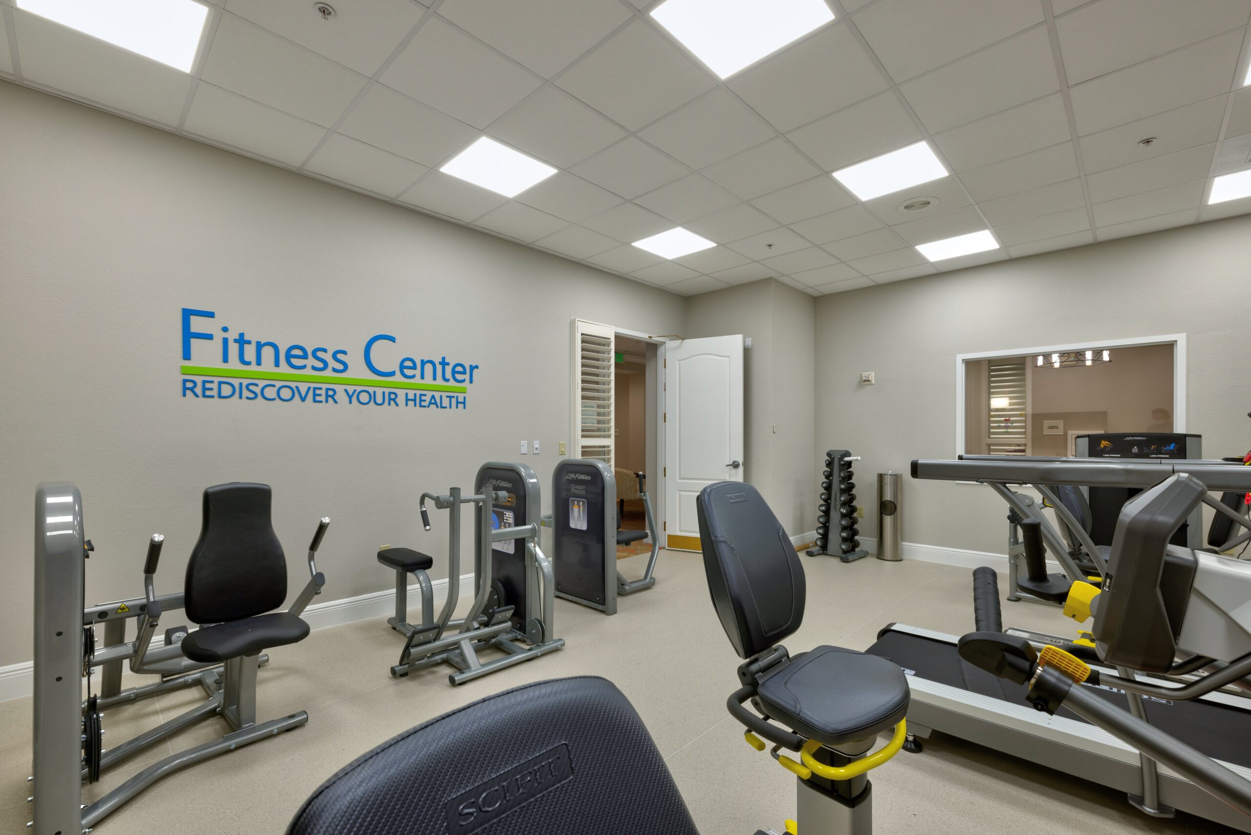 Interior view of a fitness center with equipment