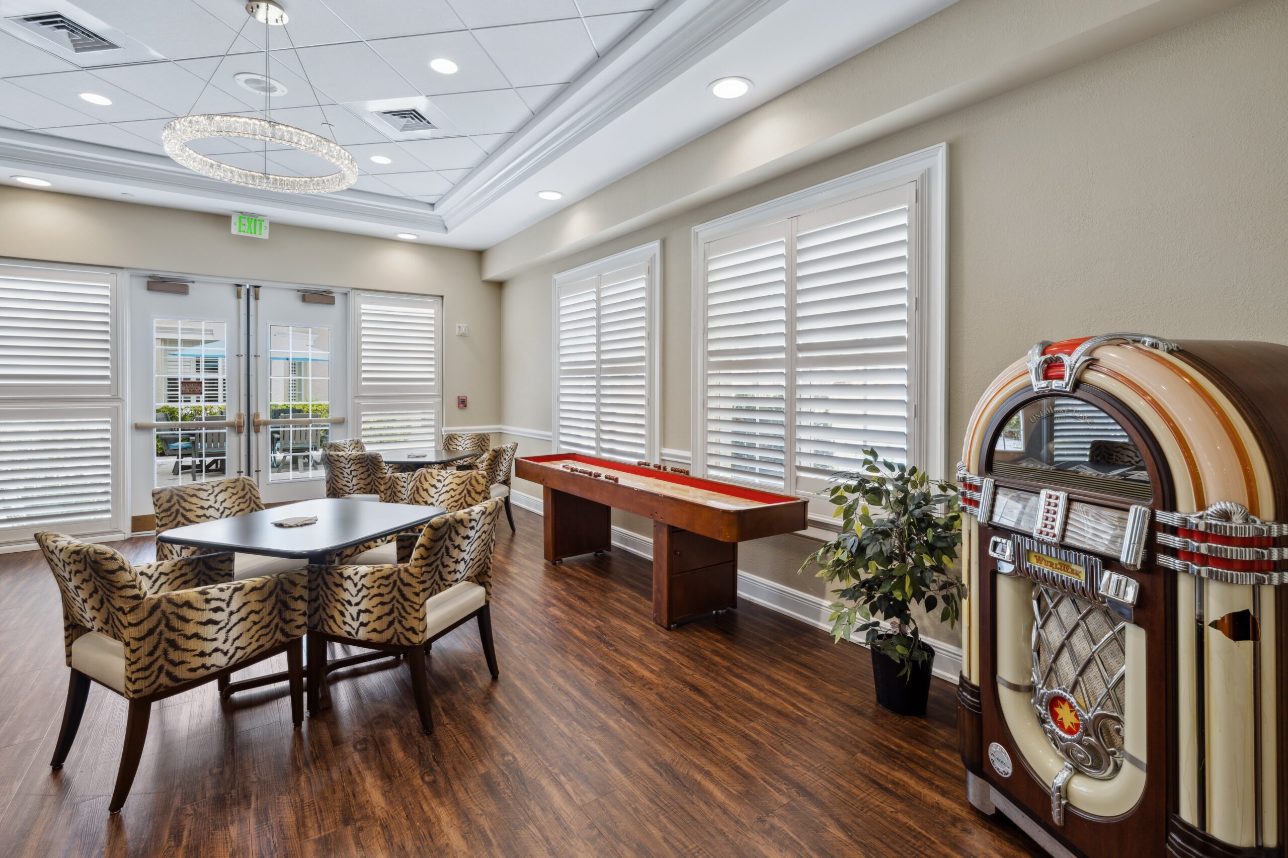 Common area with a jukebox and seating