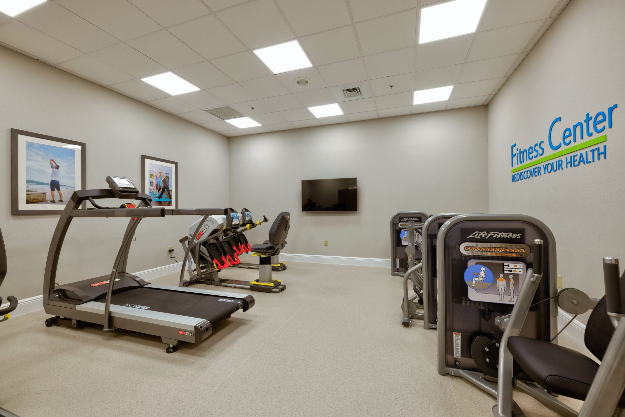 Interior view of a fitness center with exercise equipment