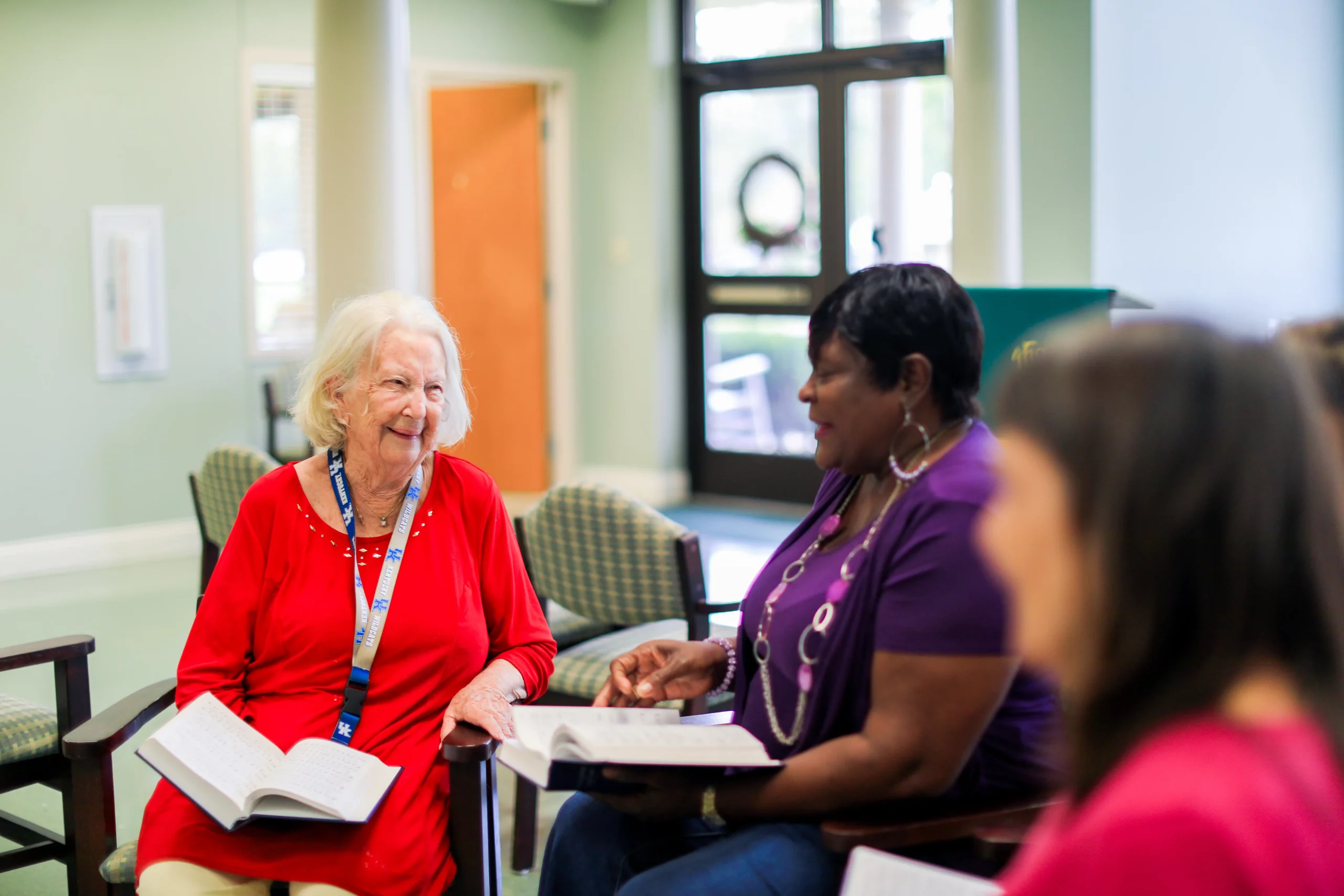 Residents chatting in a common area