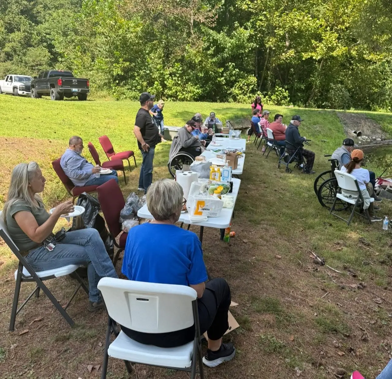 Residents enjoying an outdoor meal together