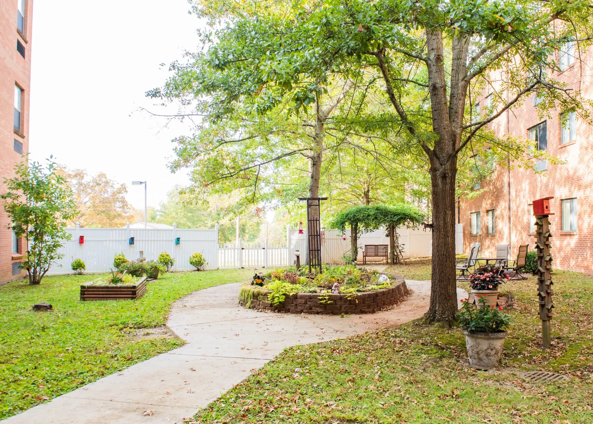 Outdoor garden area with walking paths and seating