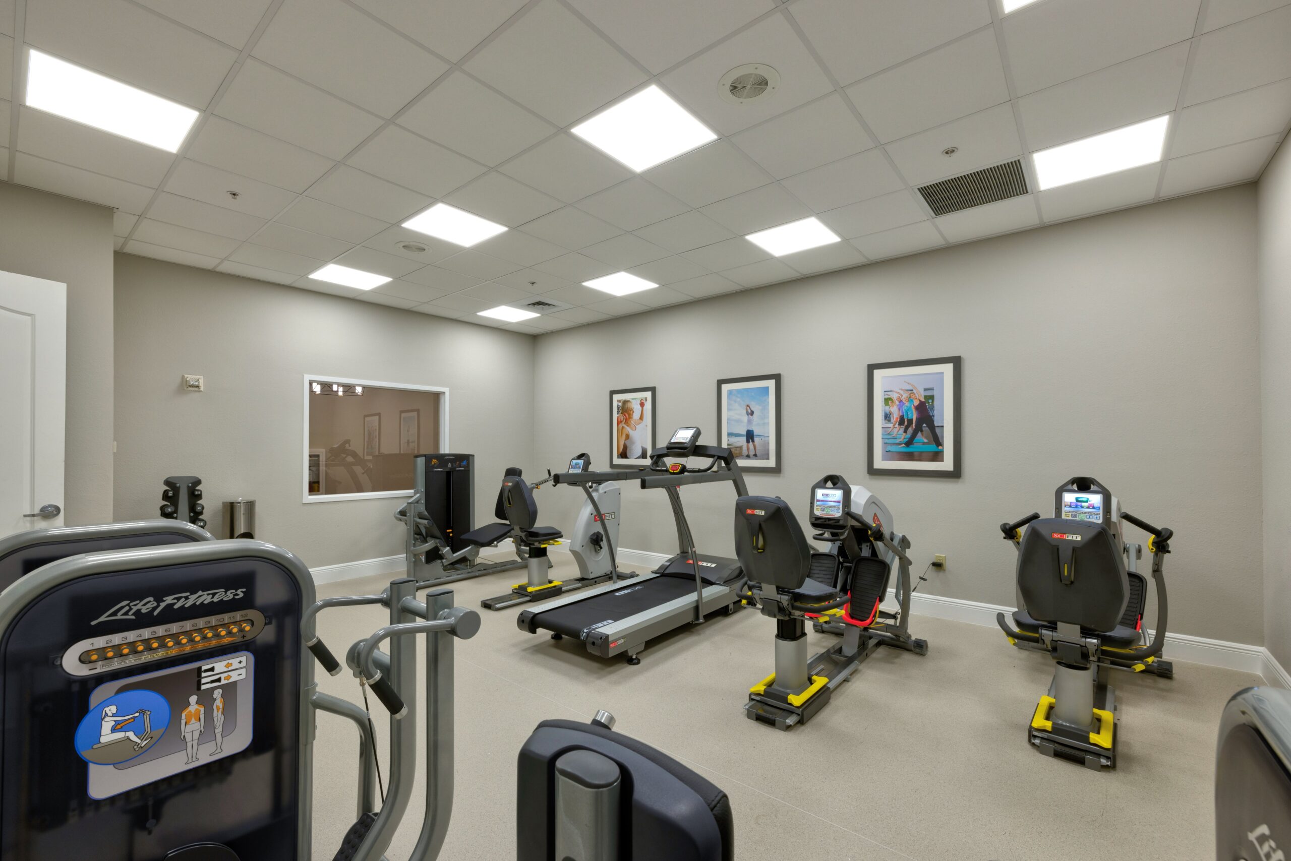 Interior view of a fitness center with exercise equipment
