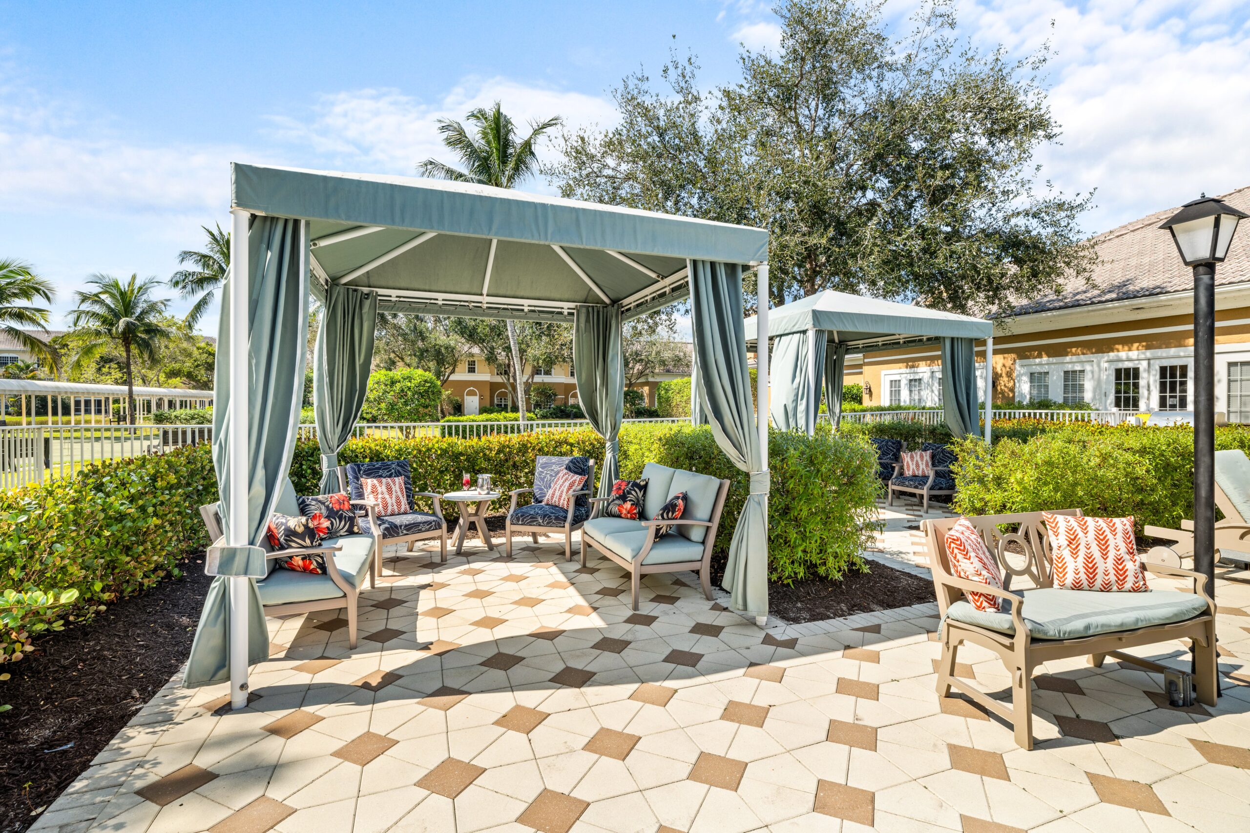 Outdoor seating area with shaded gazebos