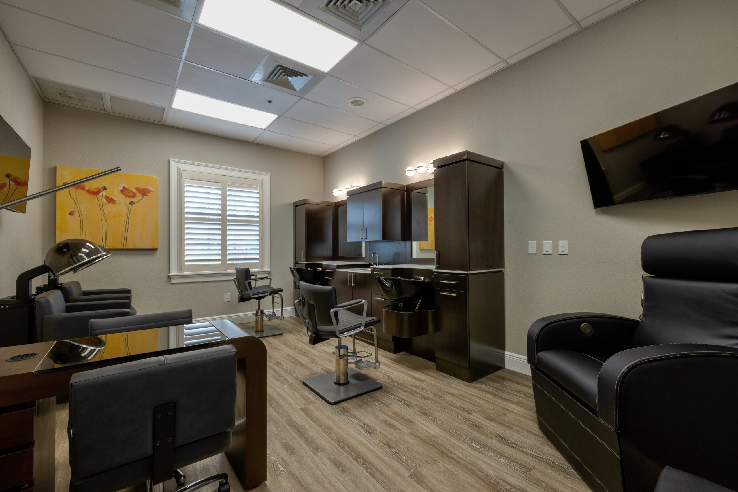 Interior view of a salon area with styling chairs
