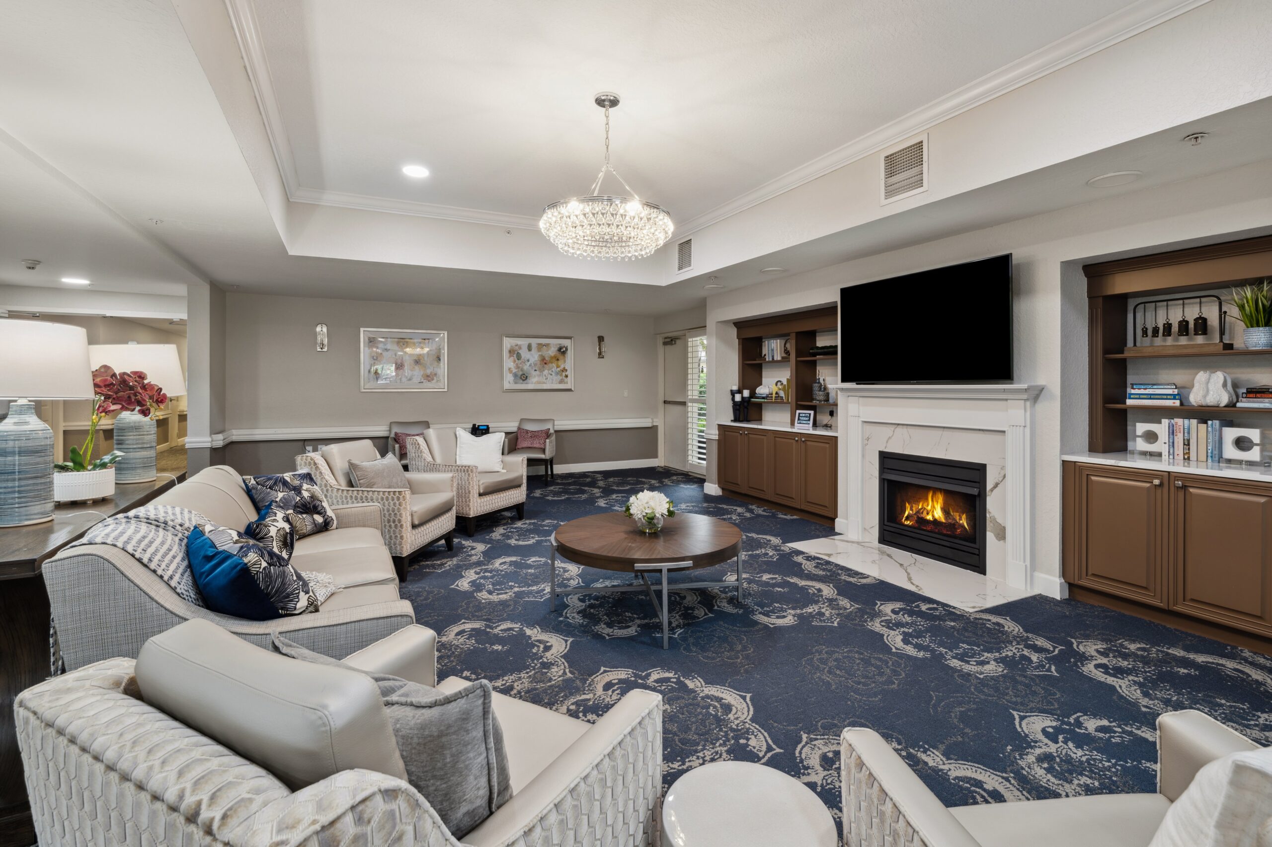 Common area lounge with comfortable seating and fireplace