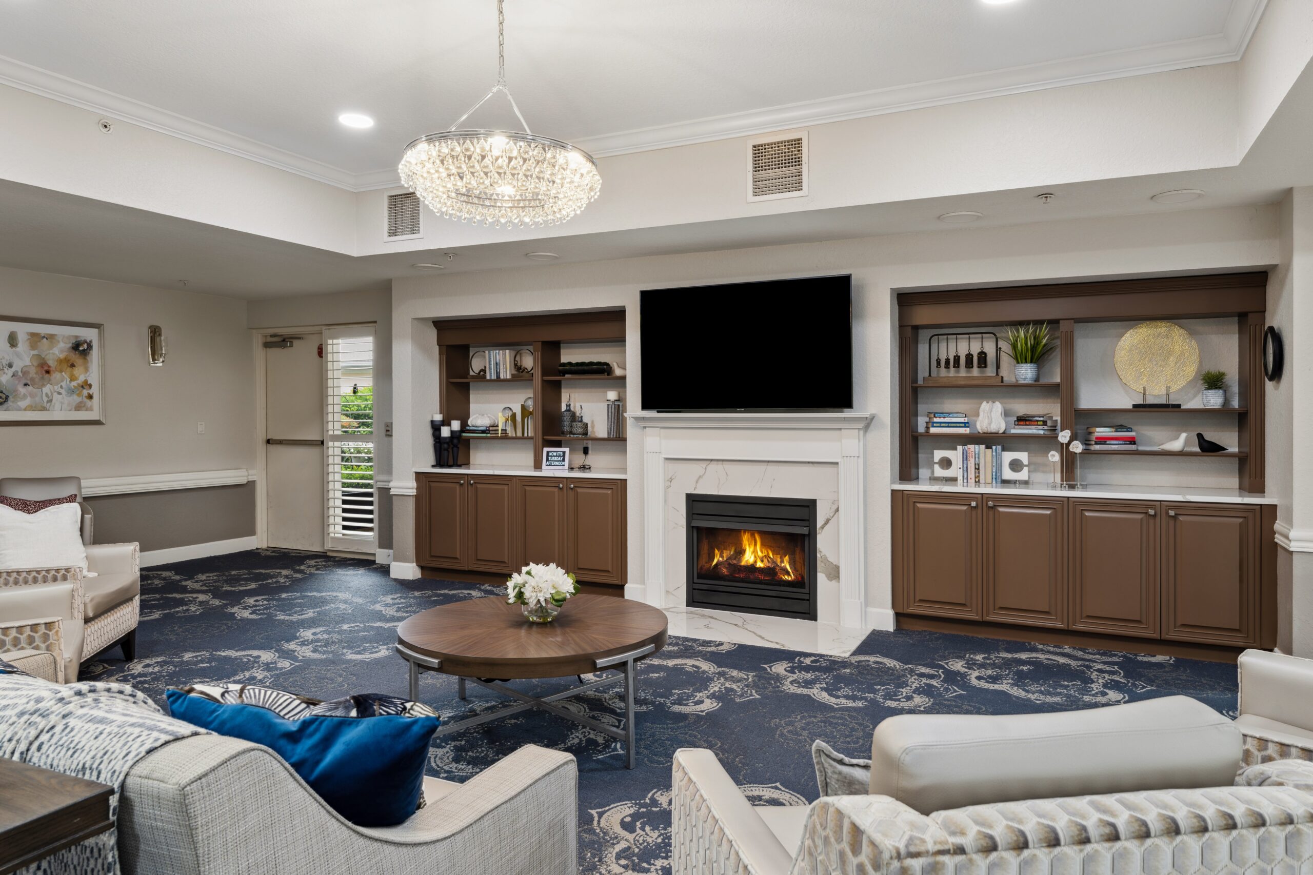 Bright and inviting common area with a fireplace