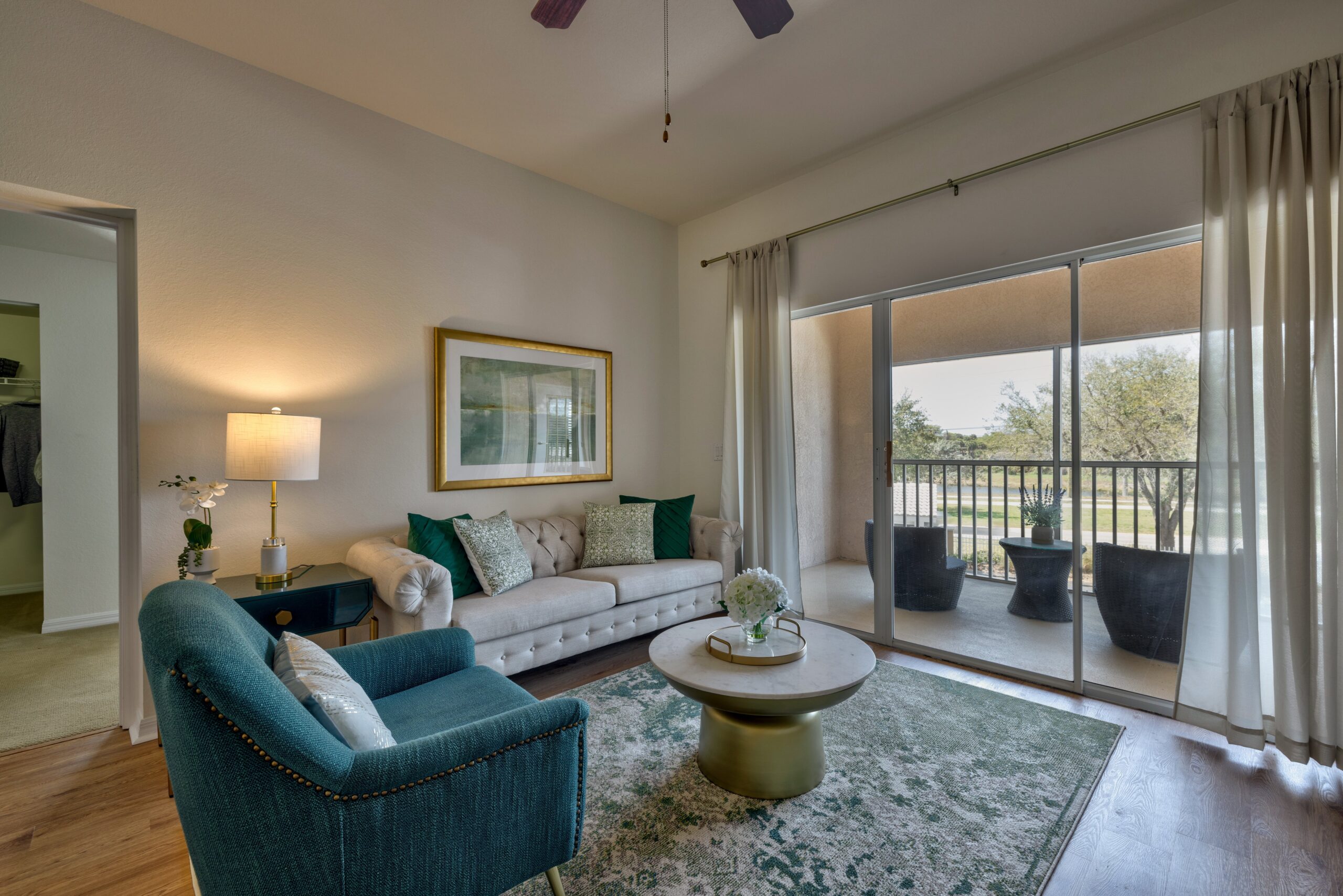 Bright and inviting living area with balcony access