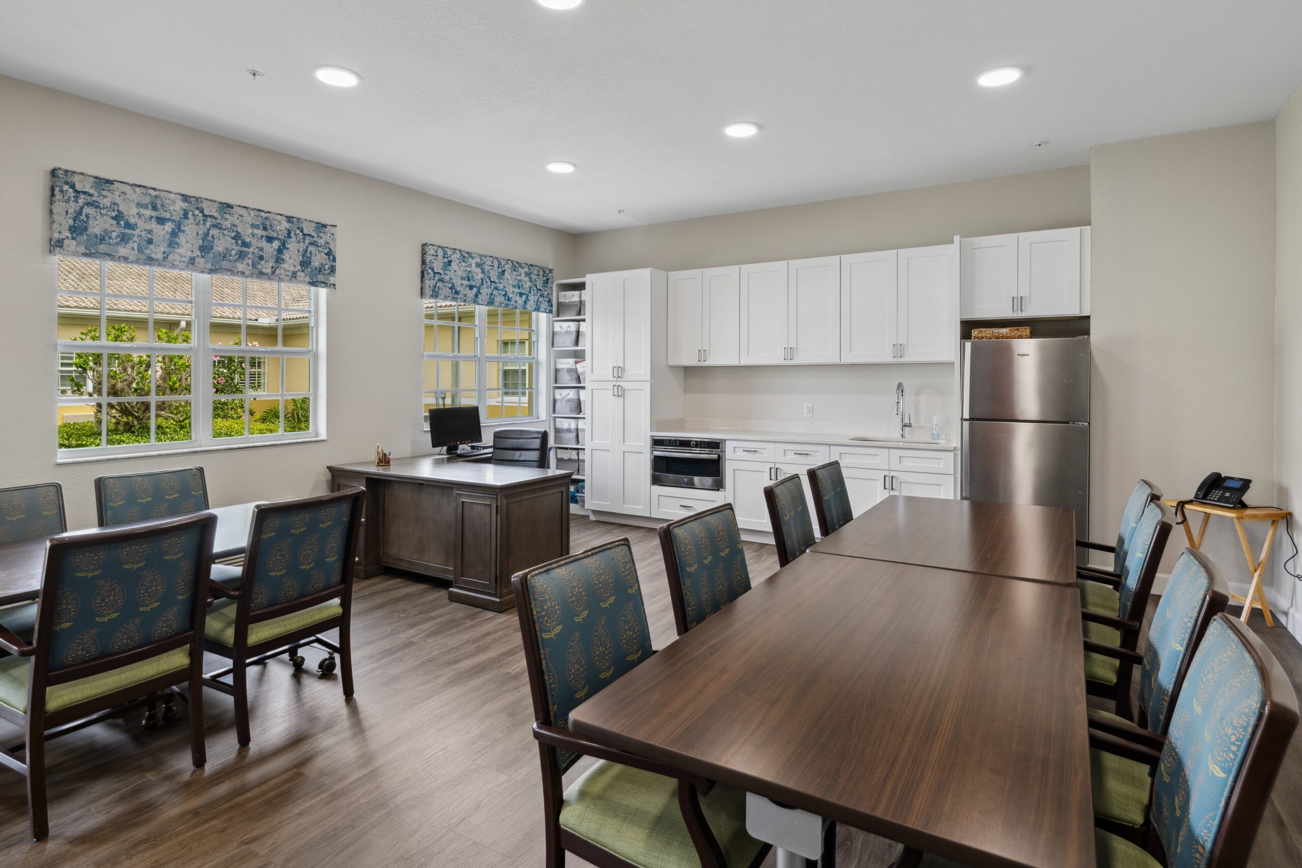 Bright common area with tables and chairs