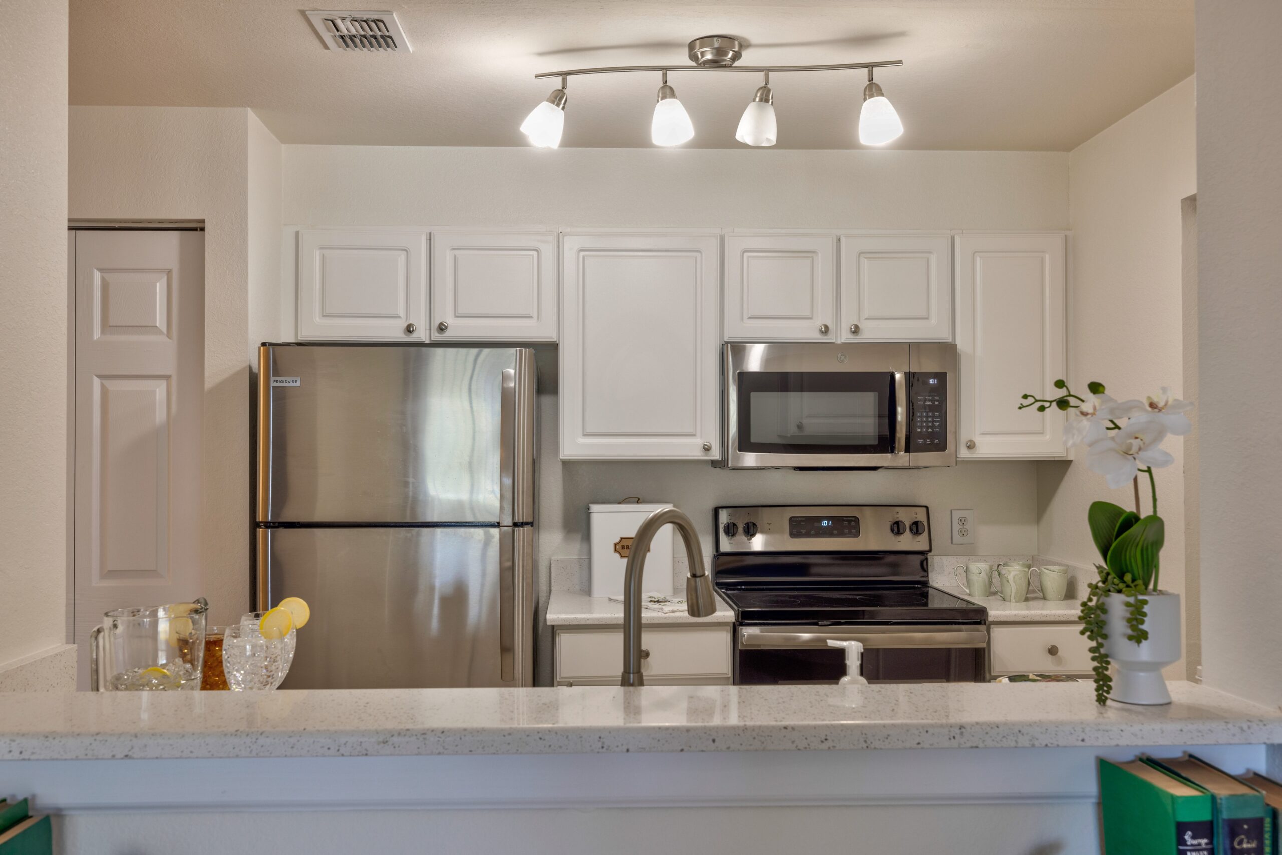 Modern kitchen with appliances and decor