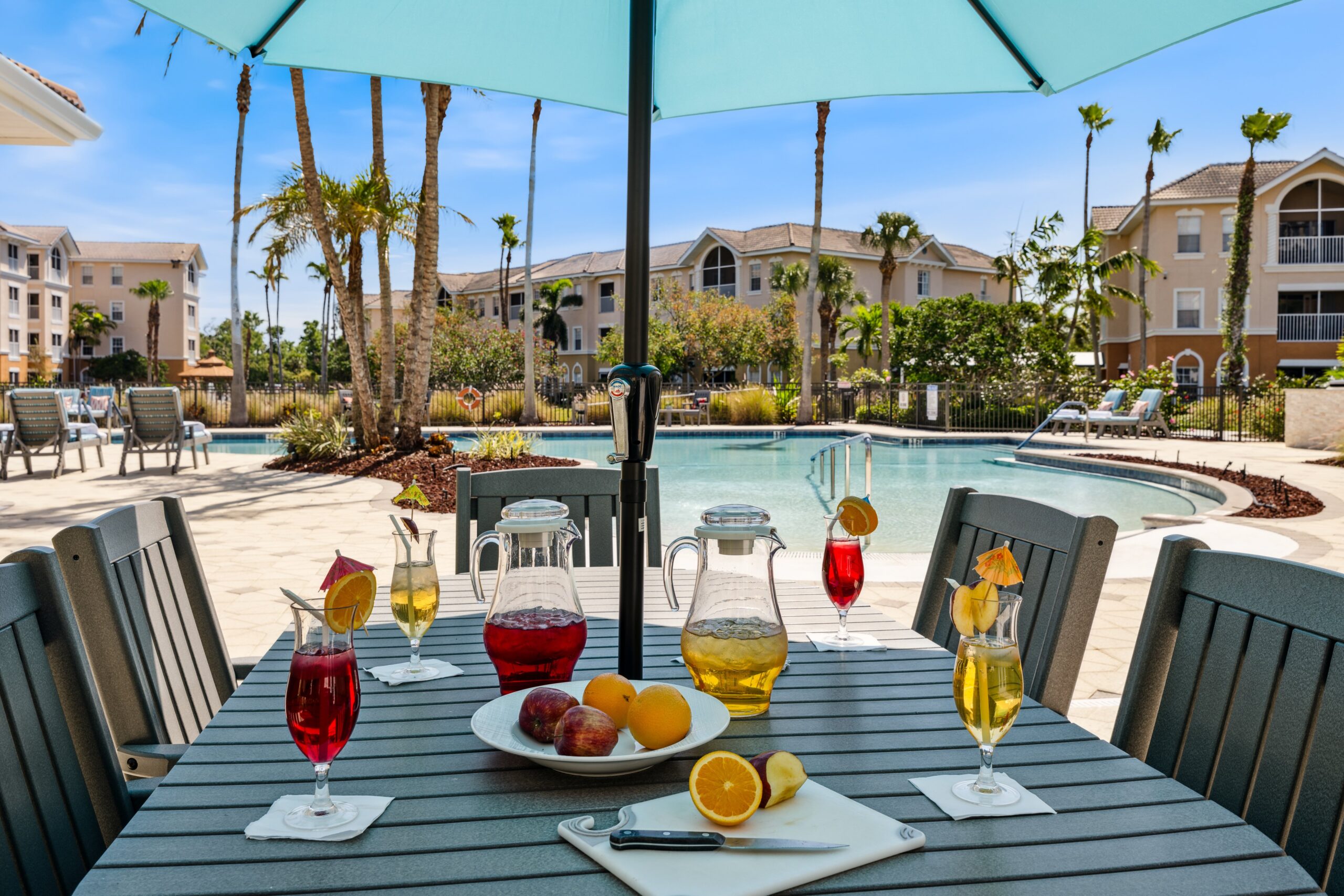 Table set with drinks by the pool area